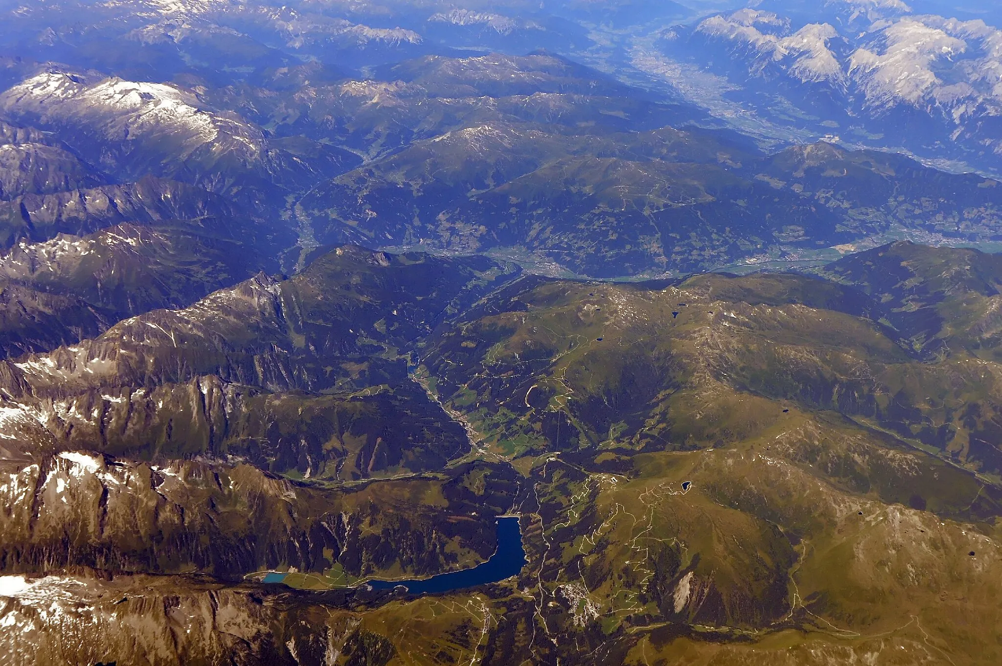 Photo showing: Bilder vom Flug Hannover Rom August 2014. Blick auf Gerlos und einige Berge der Zillertaler (Brandberger Kolm) und Kitzbüheler Alpen.