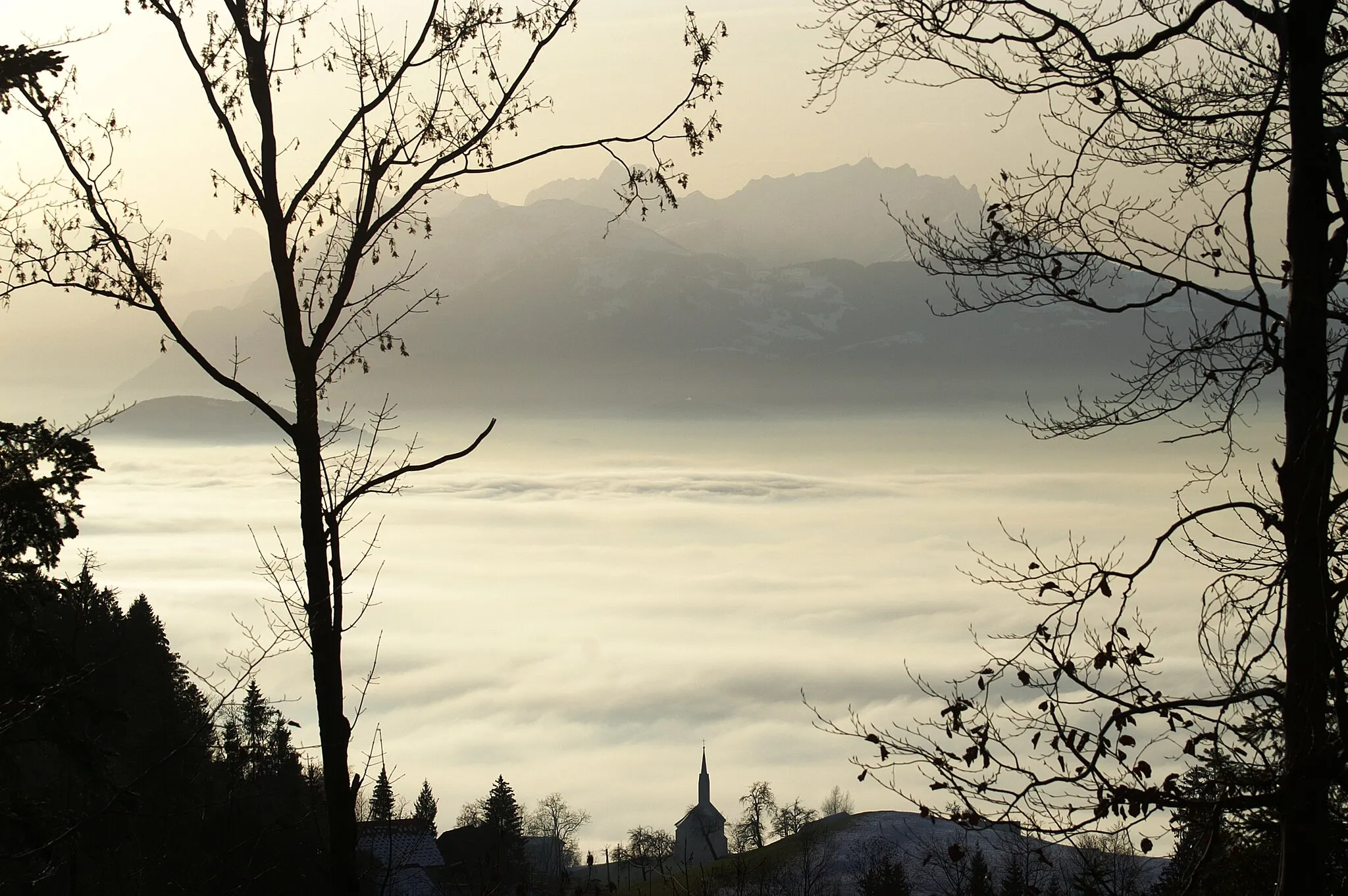 Photo showing: Fog. View from Oberfallenberg, Dornbirn district, towards the Mountains of Switzerland.