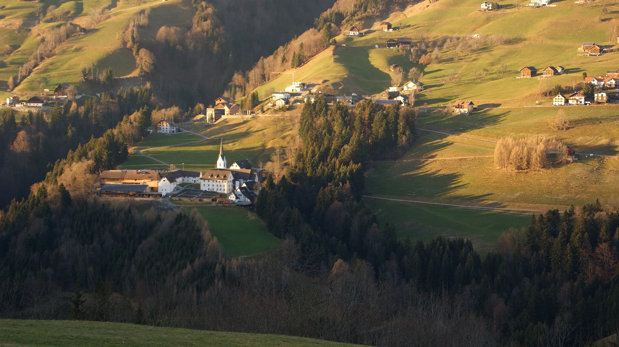 Photo showing: Benedictine provost St. Gerold in the village Sankt Gerold on the Plankenberg. In the background the Gaßnerberg and between, the Klostertobel (meaning: monastery-ravine.