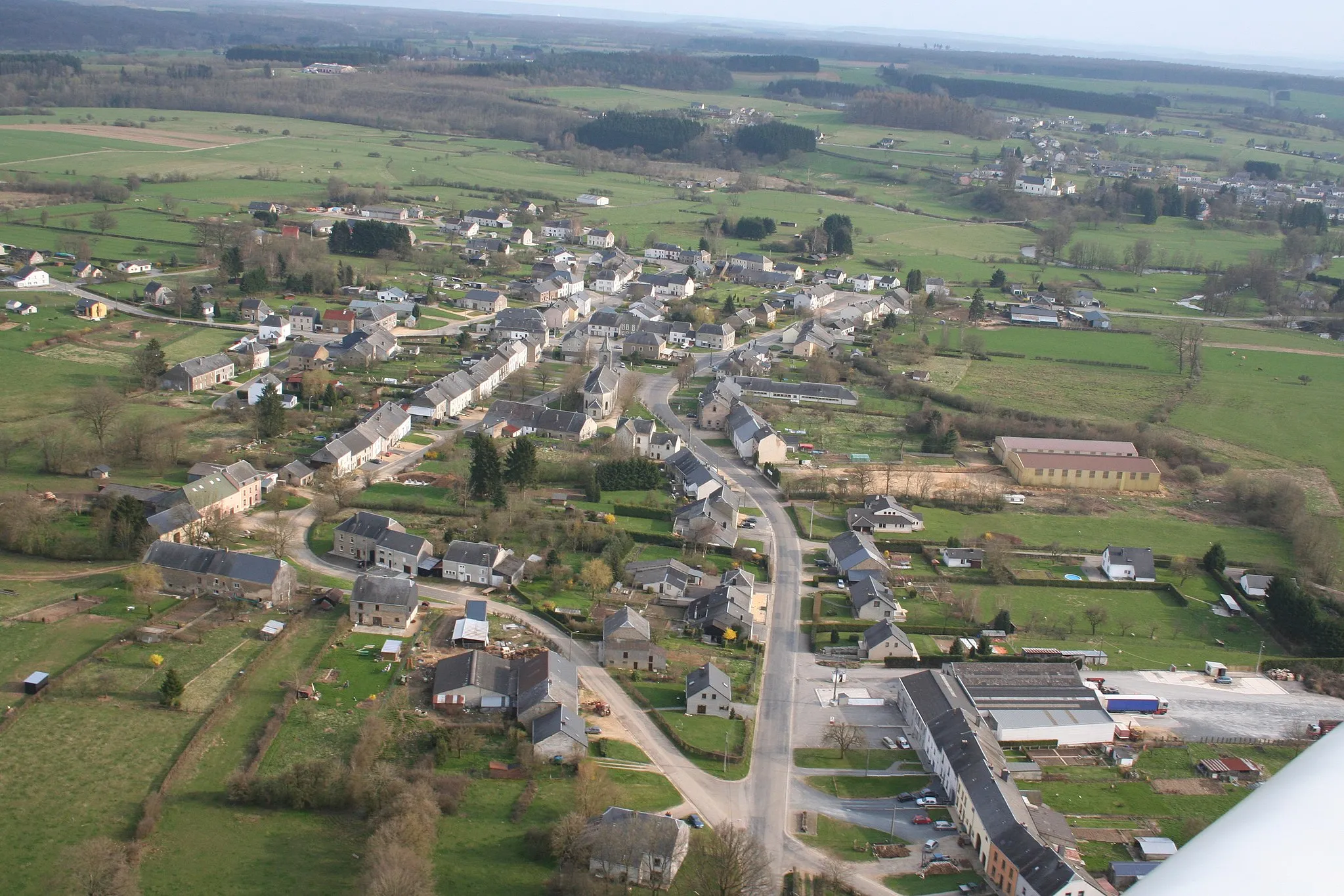 Photo showing: An air sight of the small village of Les Bulles in the very south of Belgium.