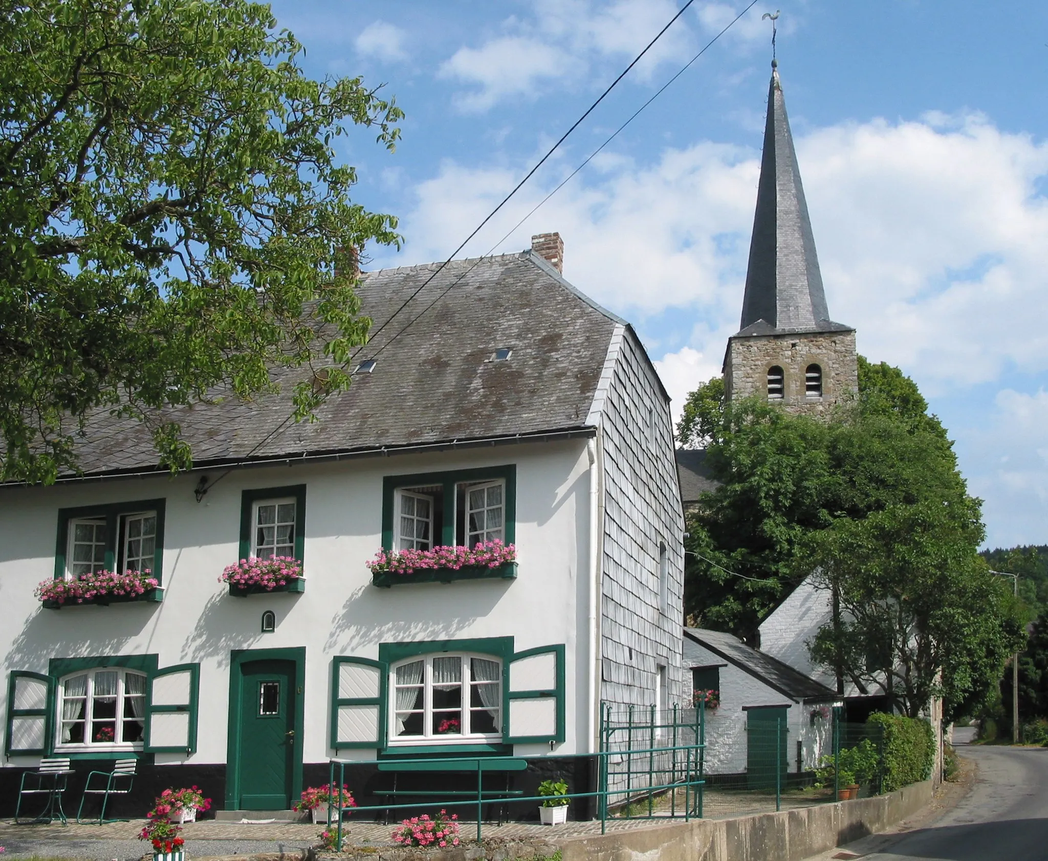 Photo showing: Wéris (Belgium) - rue des Dolmens: previous farm and church of  Saint Walburge  (XI/XIIth centuries).