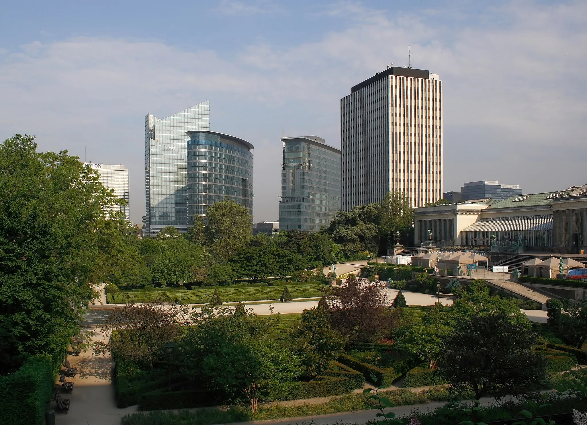 Photo showing: View of the Espace Nord business district in Brussels, seen over the Botanical Garden

This  is a retouched picture, which means that it has been digitally altered from its original version. Modifications: bit noise, bit curves, bit perspective by Lycaon.