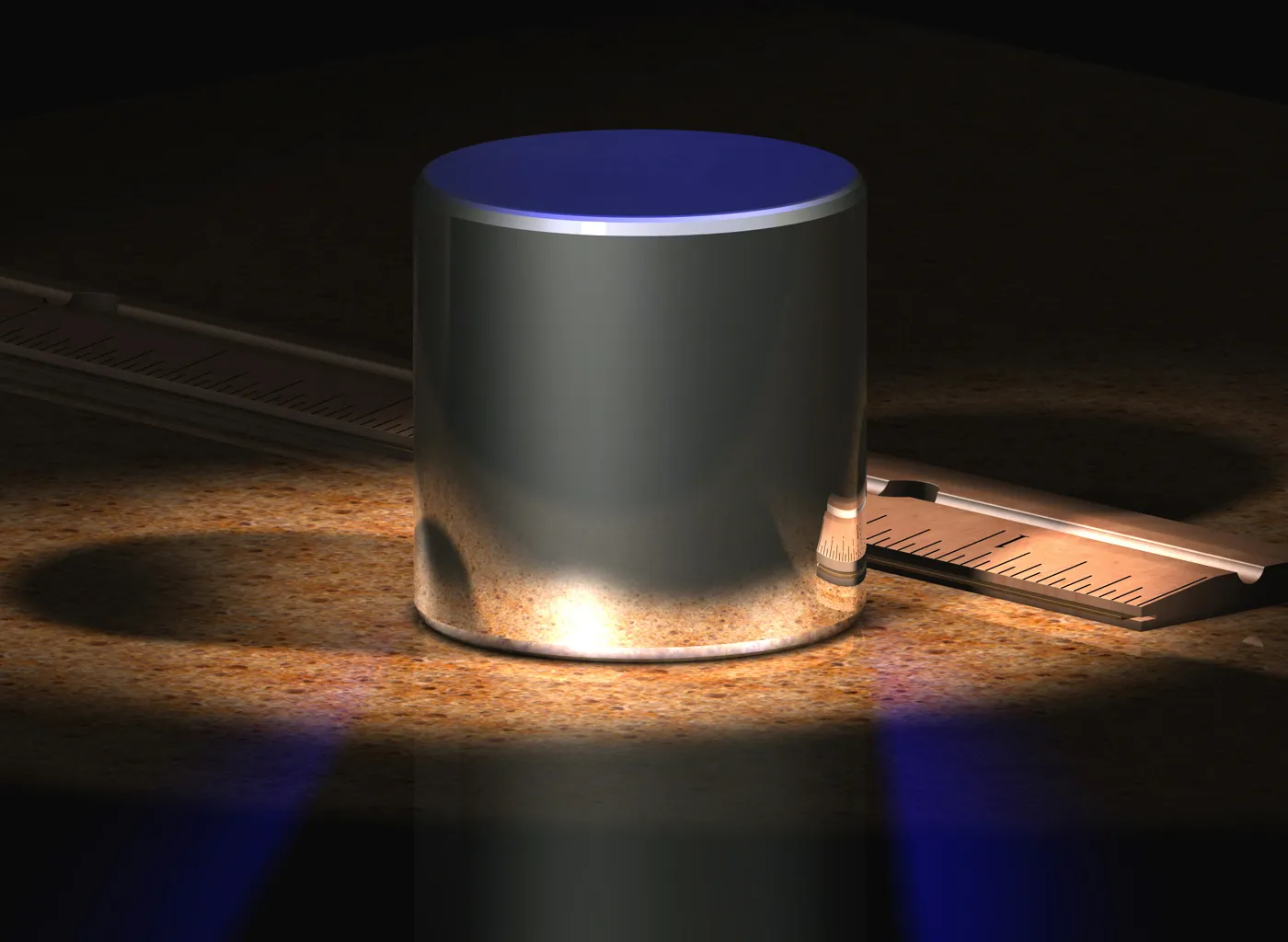 Photo showing: A computer-generated image of the International Prototype kilogram (IPK), which is made from an alloy of 90% platinum and 10% iridium (by weight) and machined into a right-circular cylinder (height = diameter) of 39.17 mm. The IPK is kept at the Bureau International des Poids et Mesures (International Bureau of Weights and Measures) in Sèvres on the outskirts of Paris.
The geometry of this computer model was based on the actual specifications being used for experiments in new manufacturing techniques to produce new kilogram mass standards.
Solid model and ray-traced image was created using Cobalt CAD software.
This image was provided by the contributor because of the dearth of uncopyrighted photographs of the actual IPK. This is expected to be a chronic limitation given that…

the IPK is stored in a vault nearly all the time,
there is no general public access to the BIPM (and certainly none to the vault),
and working copies of the IPK are used at the BIPM for routine calibrations for years on-end.