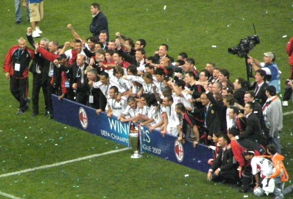 Photo showing: AC Milan players celebrate with the trophy after they beat Liverpool 2-1 to win the Champions League Final match at the Olympic Stadium in Athens.