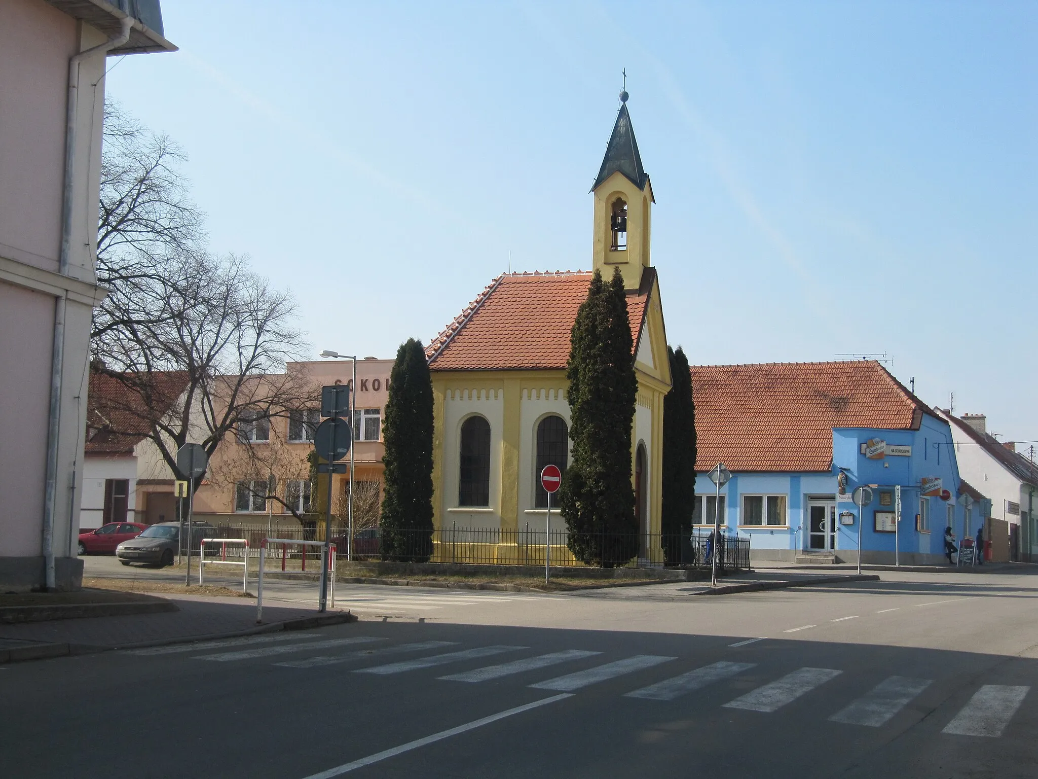 Photo showing: Sokolnice in Brno-Country District, Czech Republic. Center of the village with chapel and Sokol home.