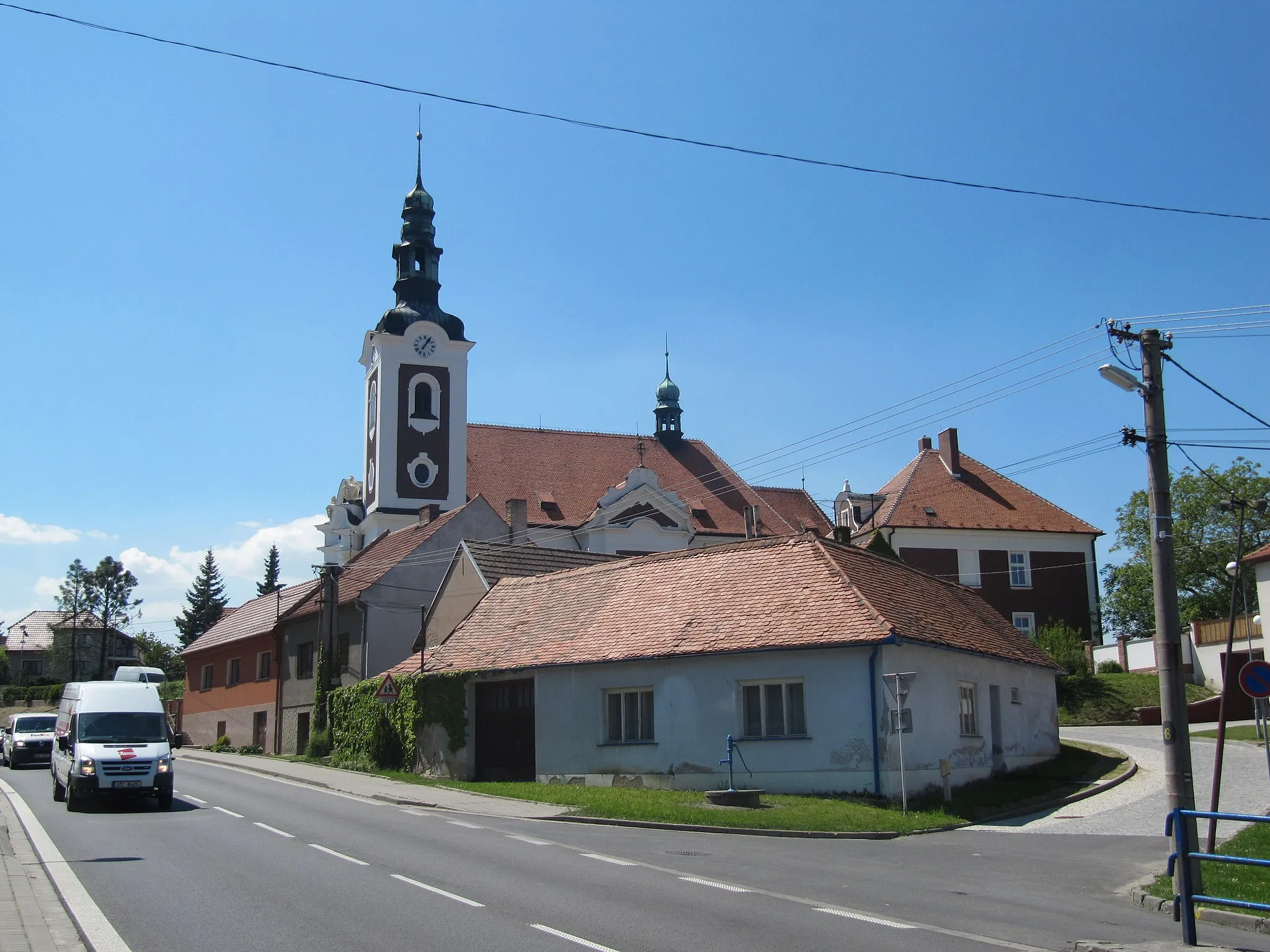 Photo showing: Vnorovy in Hodonín District, Czech Republic. Main street and church.