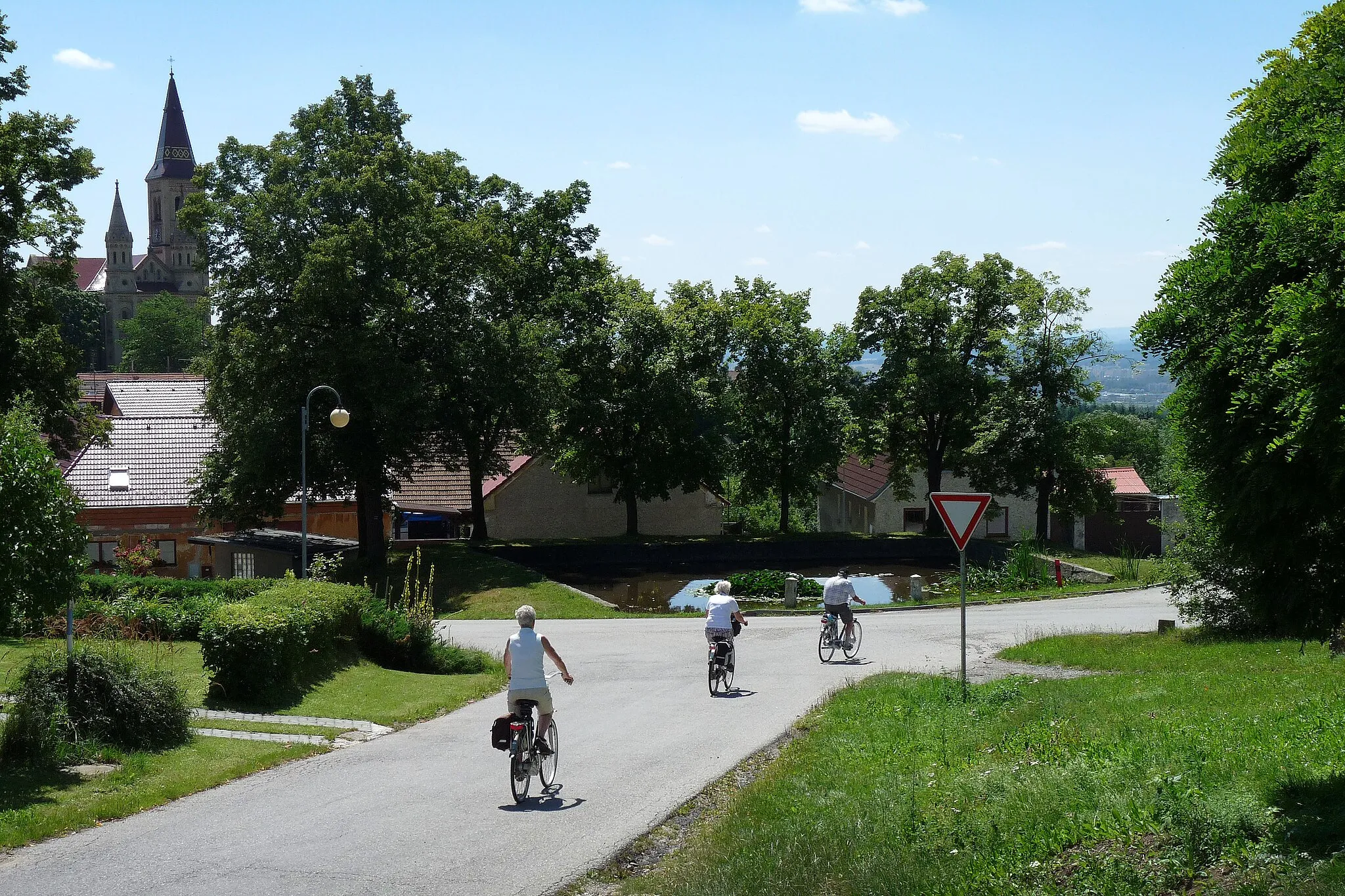 Photo showing: Cyclists in the village of Hosín, České Budějovice District, Czech Republic.