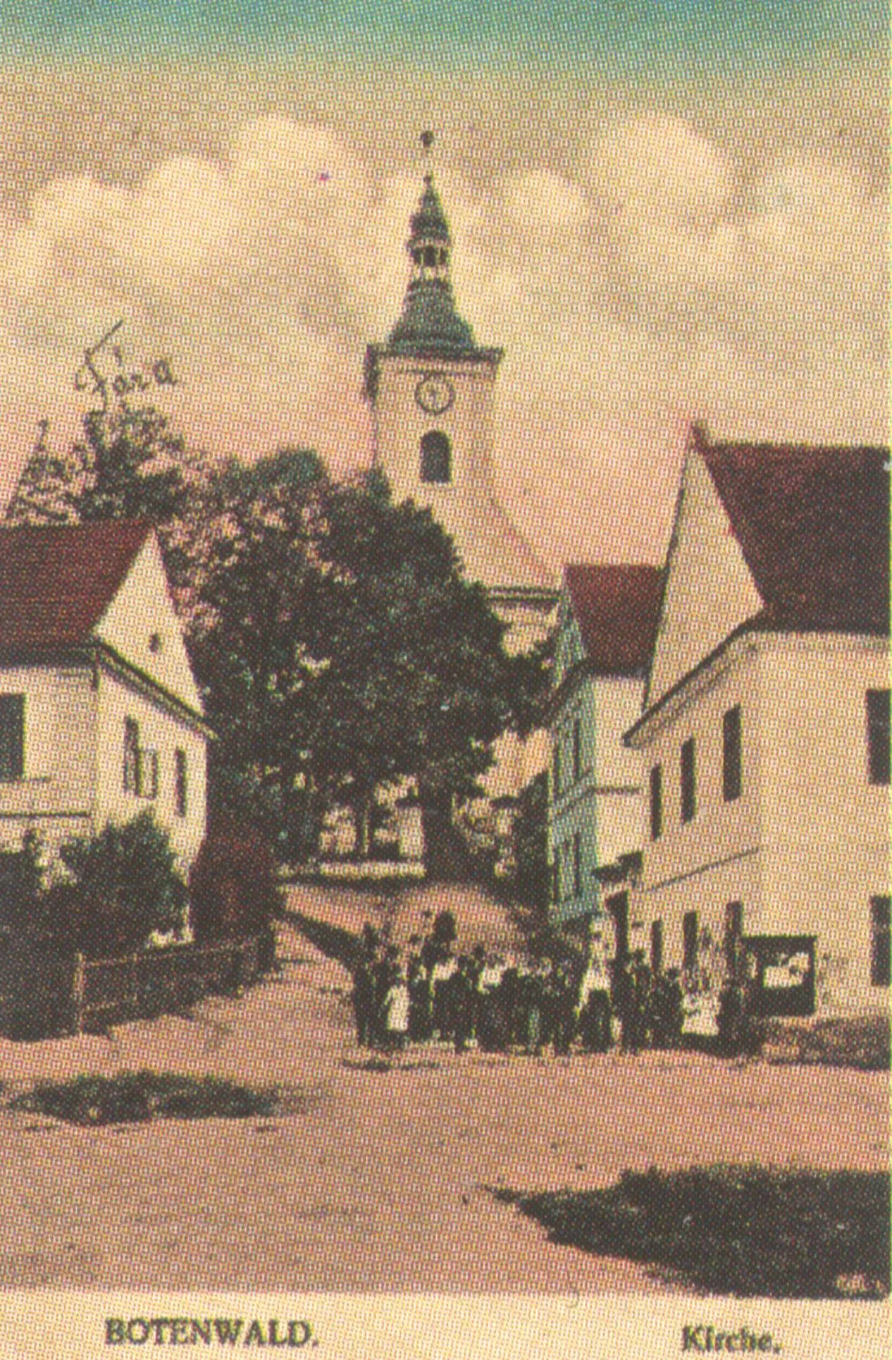 Photo showing: (Studénka-)Butovice, green in front of the All Saints' church, L vicarage, R girl's elementary and civic school, from a postcard dated cca 1910