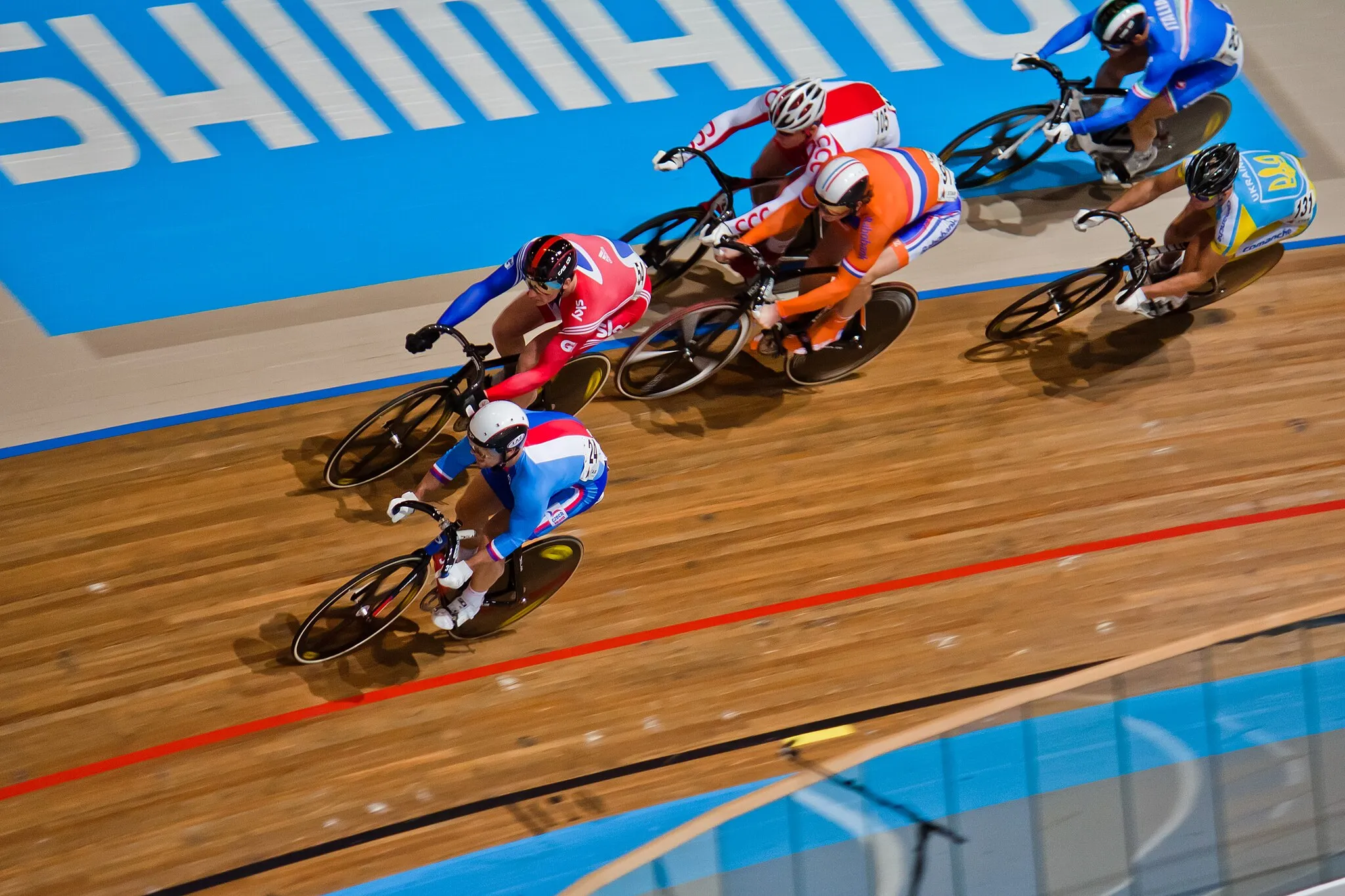 Photo showing: Men's keirin qualifying, heat 2. Adam Ptacnik (CZE#, Matthew Crampton #GBR#, Hugo Haak #NED#, Kamil Kuczynski #POL#, Andril Kutsenko #UKR# & Francesco Ceci #ITA).

At the 2011 European Elite Track Cycling Championships in Apeldoorn, Netherlands.