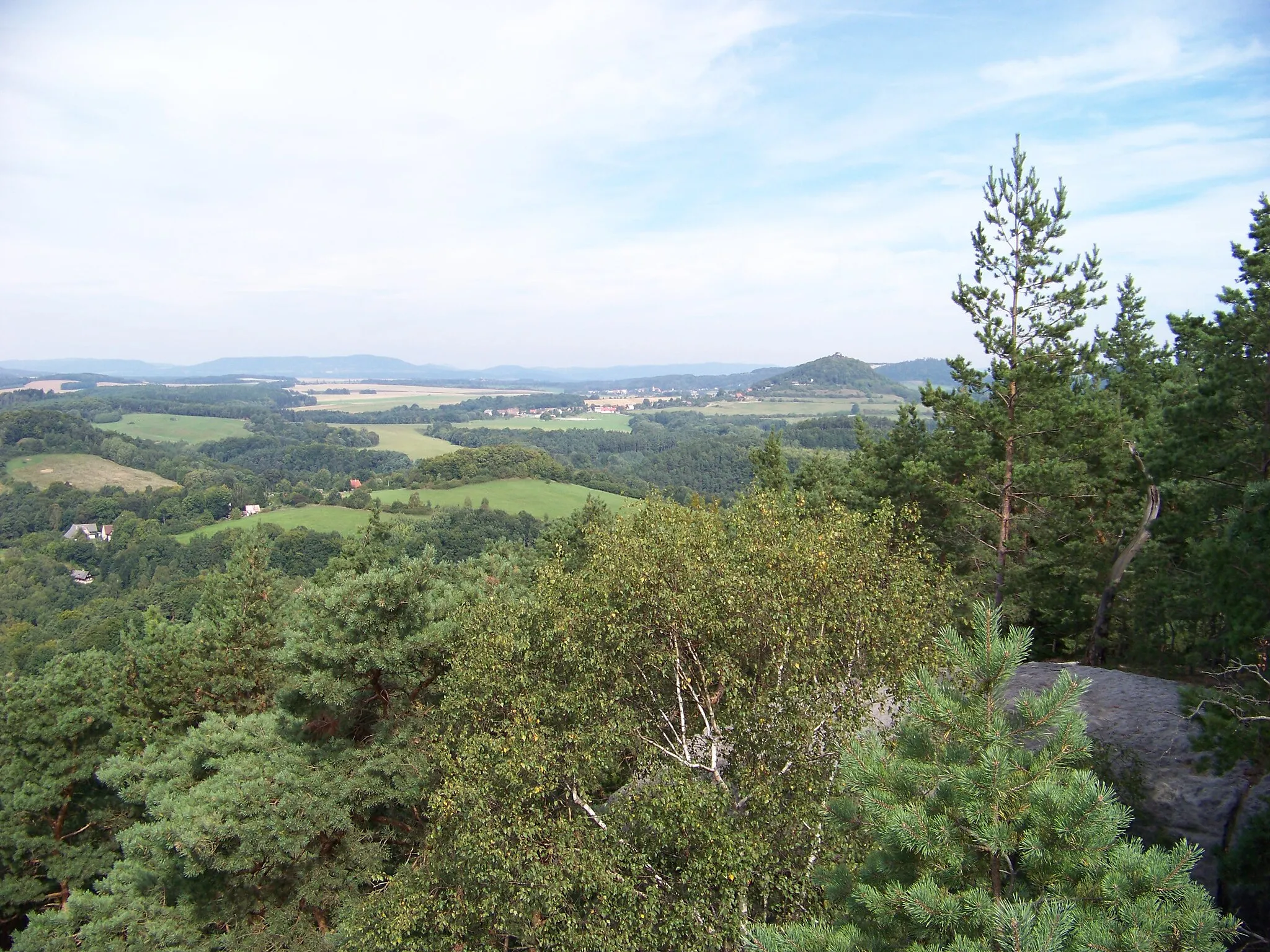 Photo showing: Dubá, Česká Lípa District, Liberec Region, Czech Republic. Plešivec and Berkovský vrch, from Vysoký vrch.