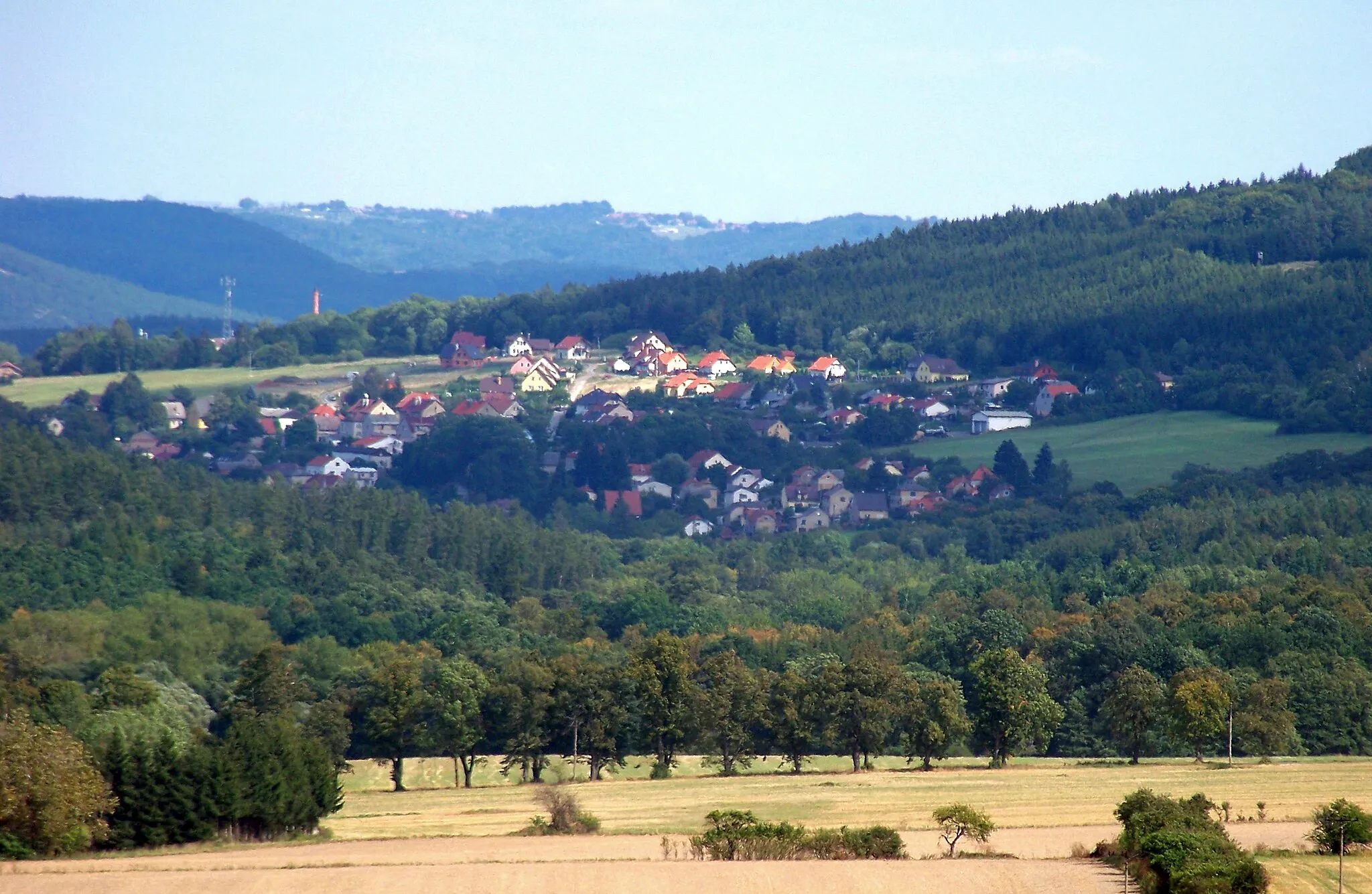 Photo showing: Rakovník District and Beroun District, Central Bohemian Region, the Czech Republic. A view of Nový Jáchymov from Špička Hill.