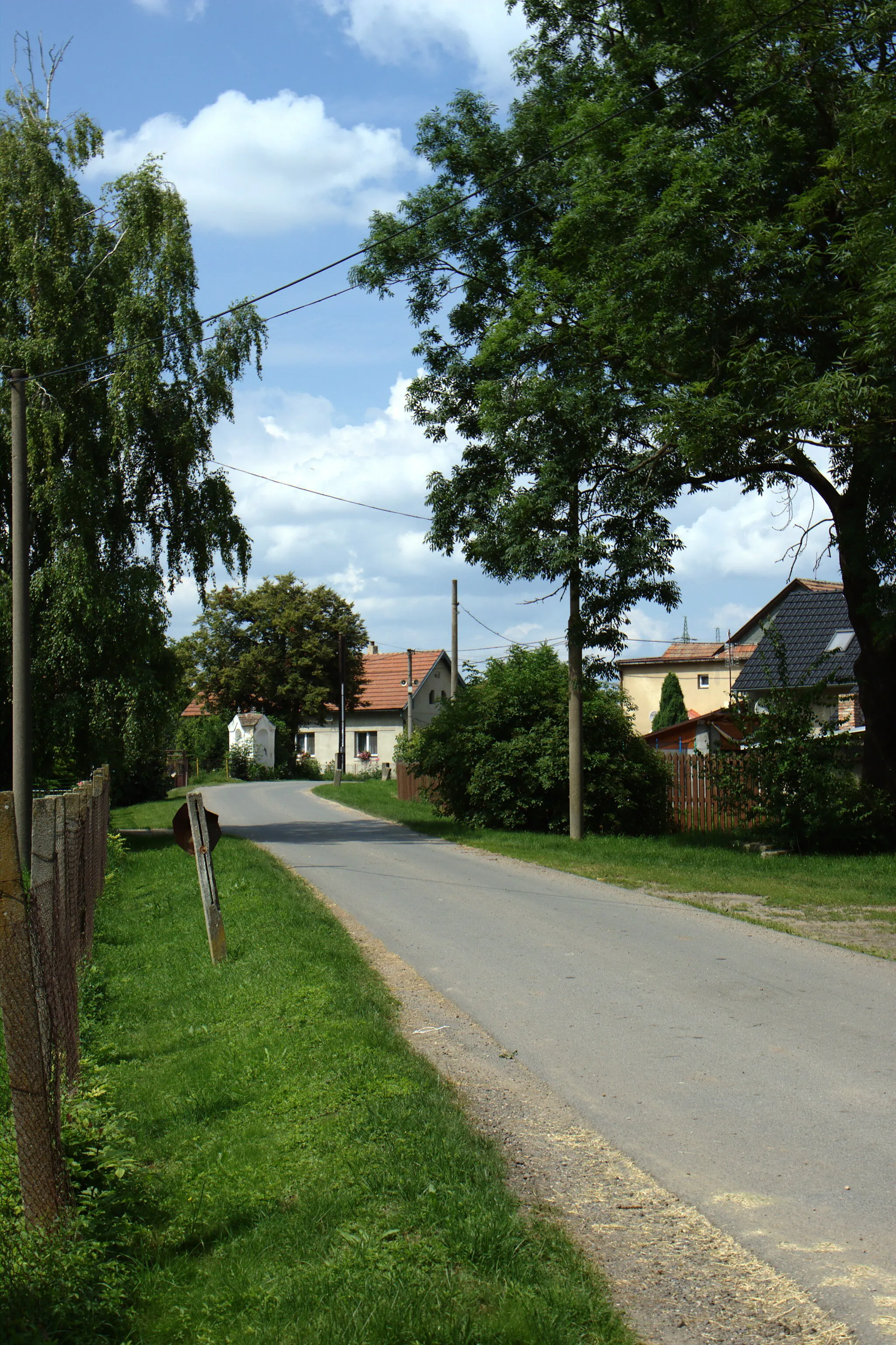 Photo showing: A road passing through the town of Budihostice, Central Bohemian Region, CZ