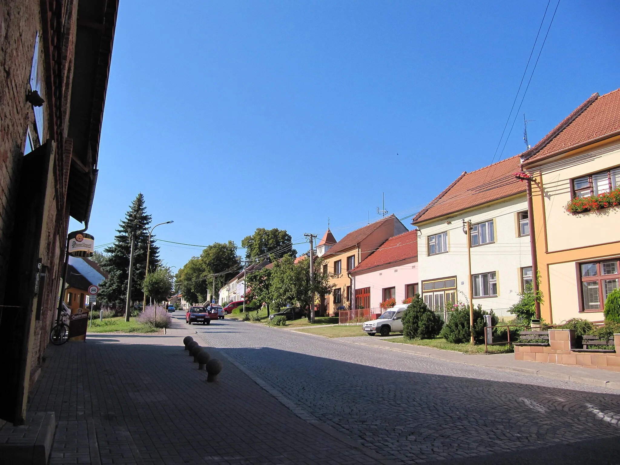 Photo showing: Vlčnov in Uherské Hradiště District, Czech Republic. Street in the front of municipal office.