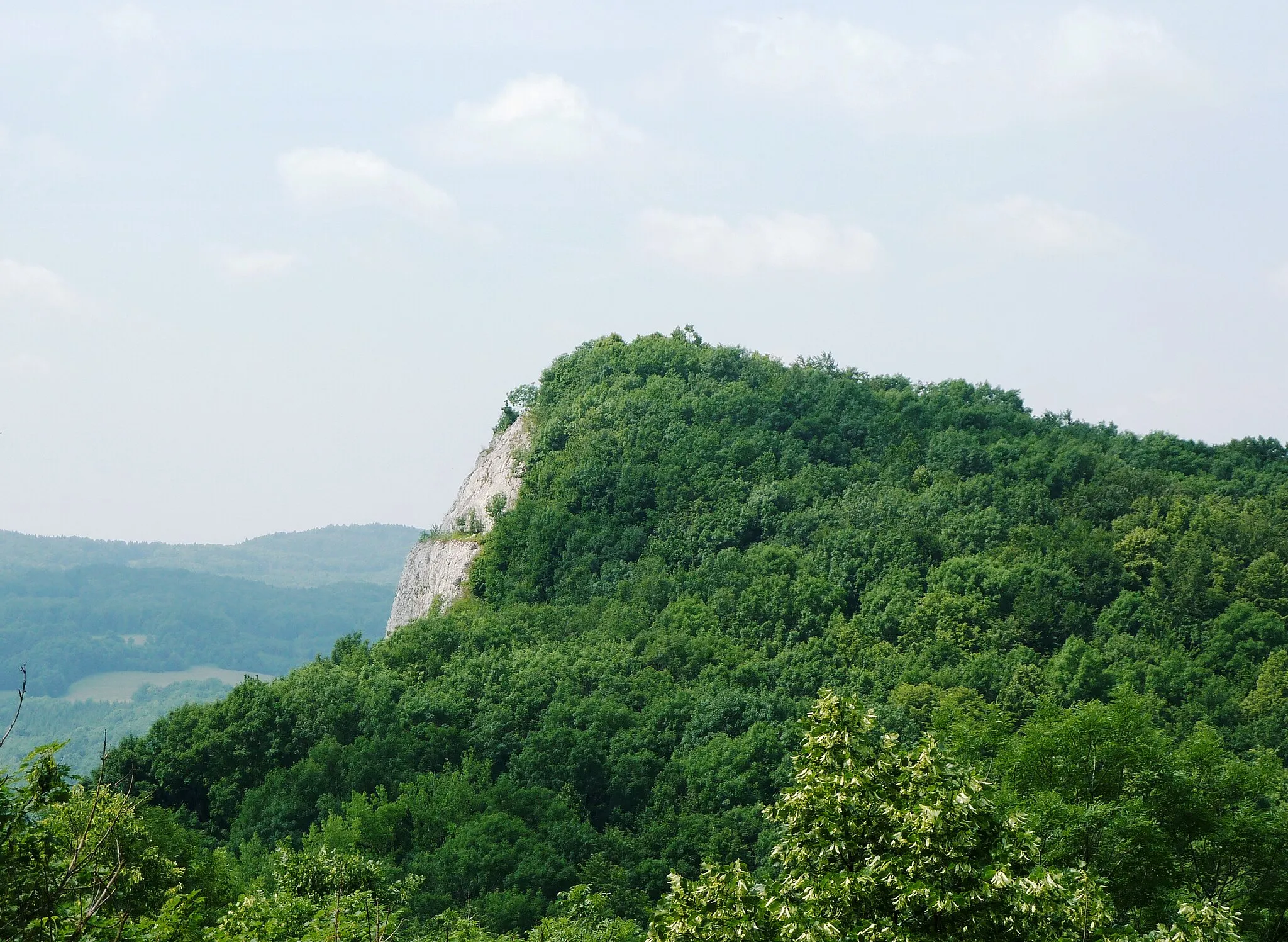 Photo showing: The hill Kotouč in town Štramberk (north Moravia, Czech Republic). The hill was partially destroyed by minig of limestone.