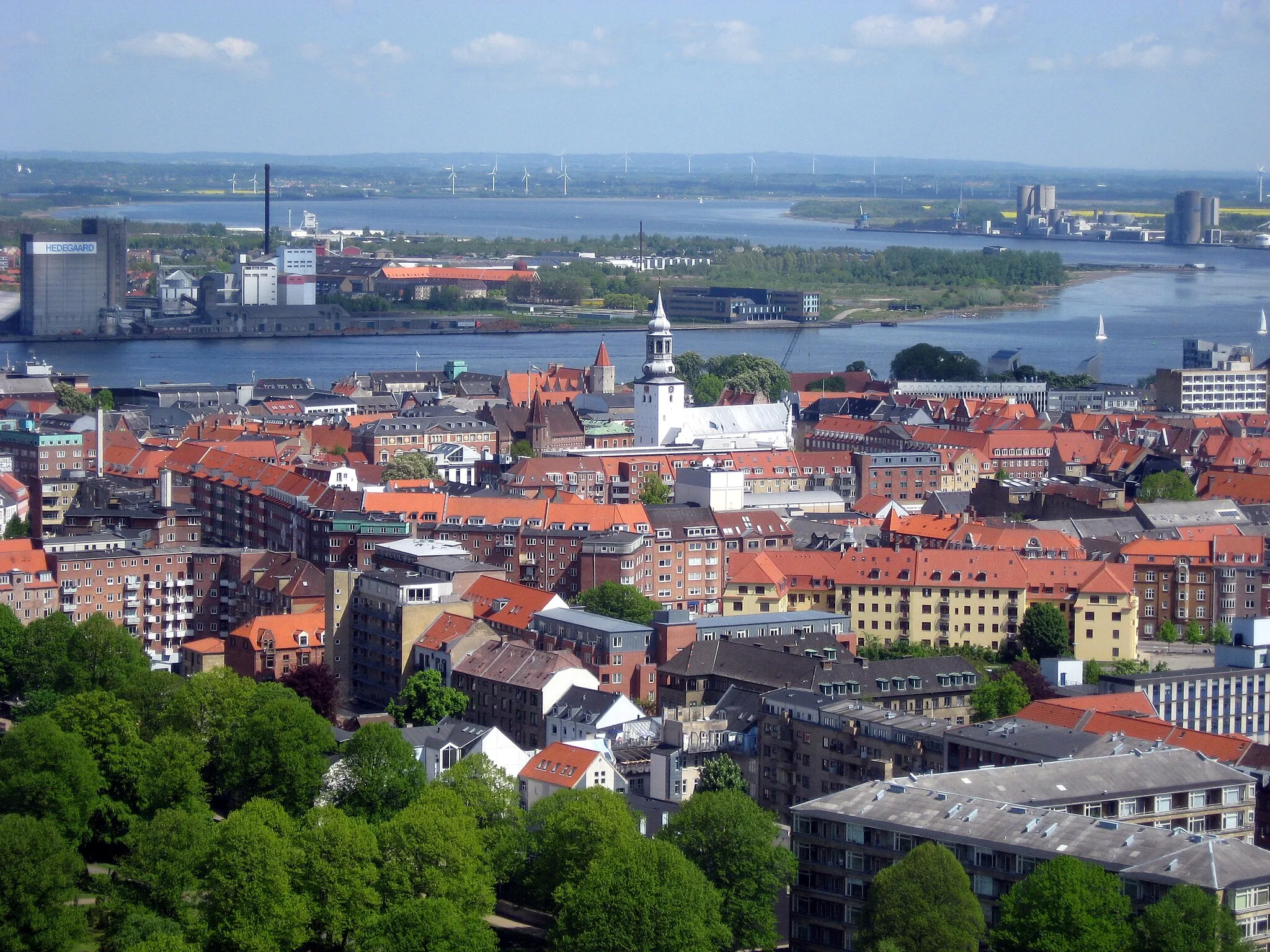 Photo showing: Aalborg (a town in Denmark). In the background: Limfjord and wind turbines