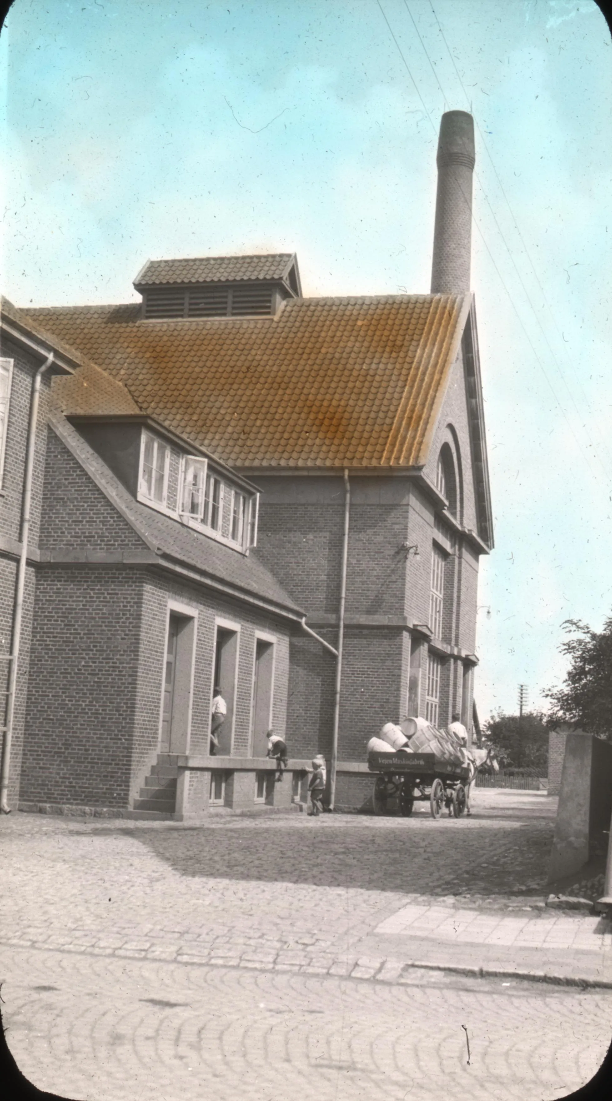 Photo showing: Image Description from historic lecture booklet: "One of the finest and largest of the cooperative butter factories is located at Vejen. It produces great quantities of butter for export. The Danes themselves, however, use comparatively little of this product."
Original Collection: Visual Instruction Department Lantern Slides
Item Number: P217:set 067 020
You can find this image by searching for the item number by clicking here.
Want more? You can find more digital resources online.

We're happy for you to share this digital image within the spirit of The Commons; however, certain restrictions on high quality reproductions of the original physical version may apply. To read more about what “no known restrictions” means, please visit the Special Collections & Archives website, or contact staff at the OSU Special Collections & Archives Research Center for details.