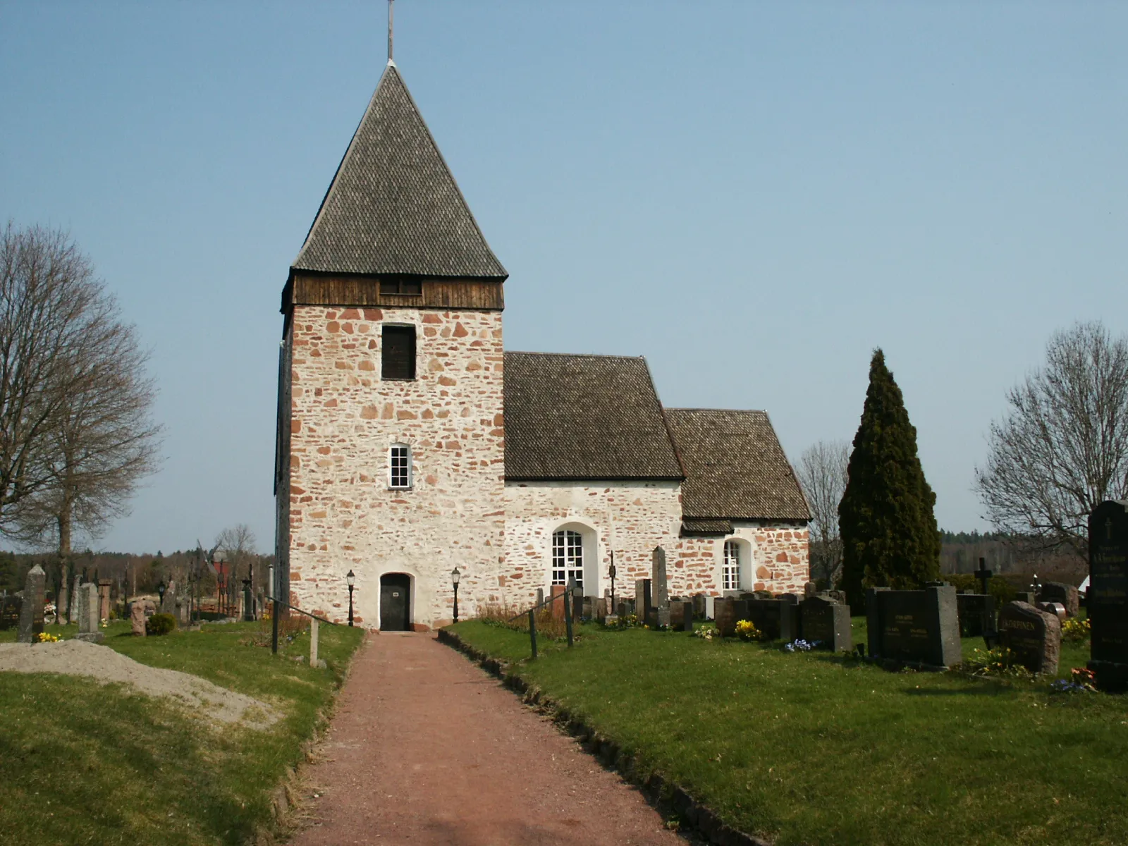 Photo showing: Hammarland church seen from the main gate, Åland, Finland, 14th century stone church