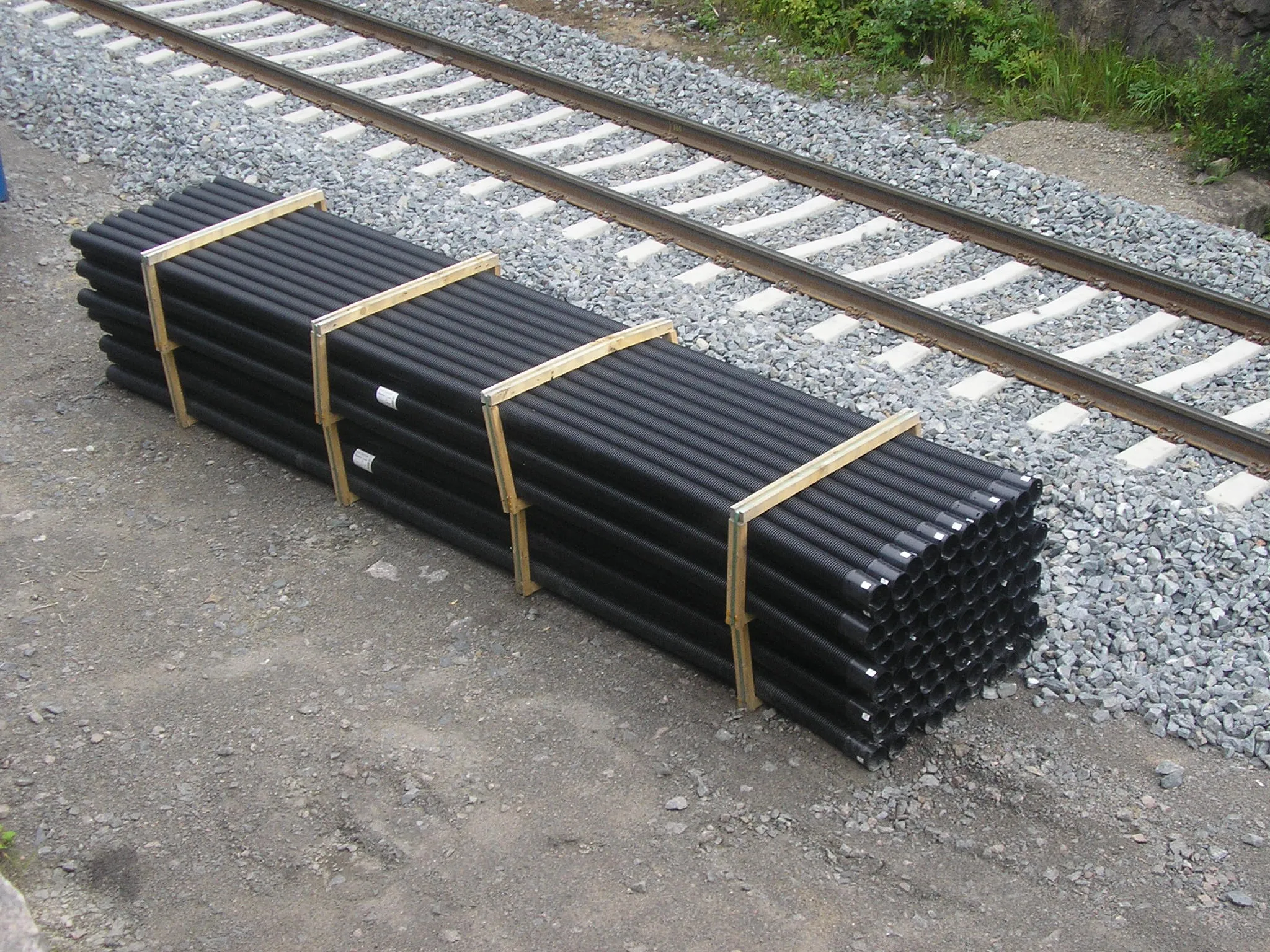 Photo showing: A stack of pipes in Muurame, Finland,