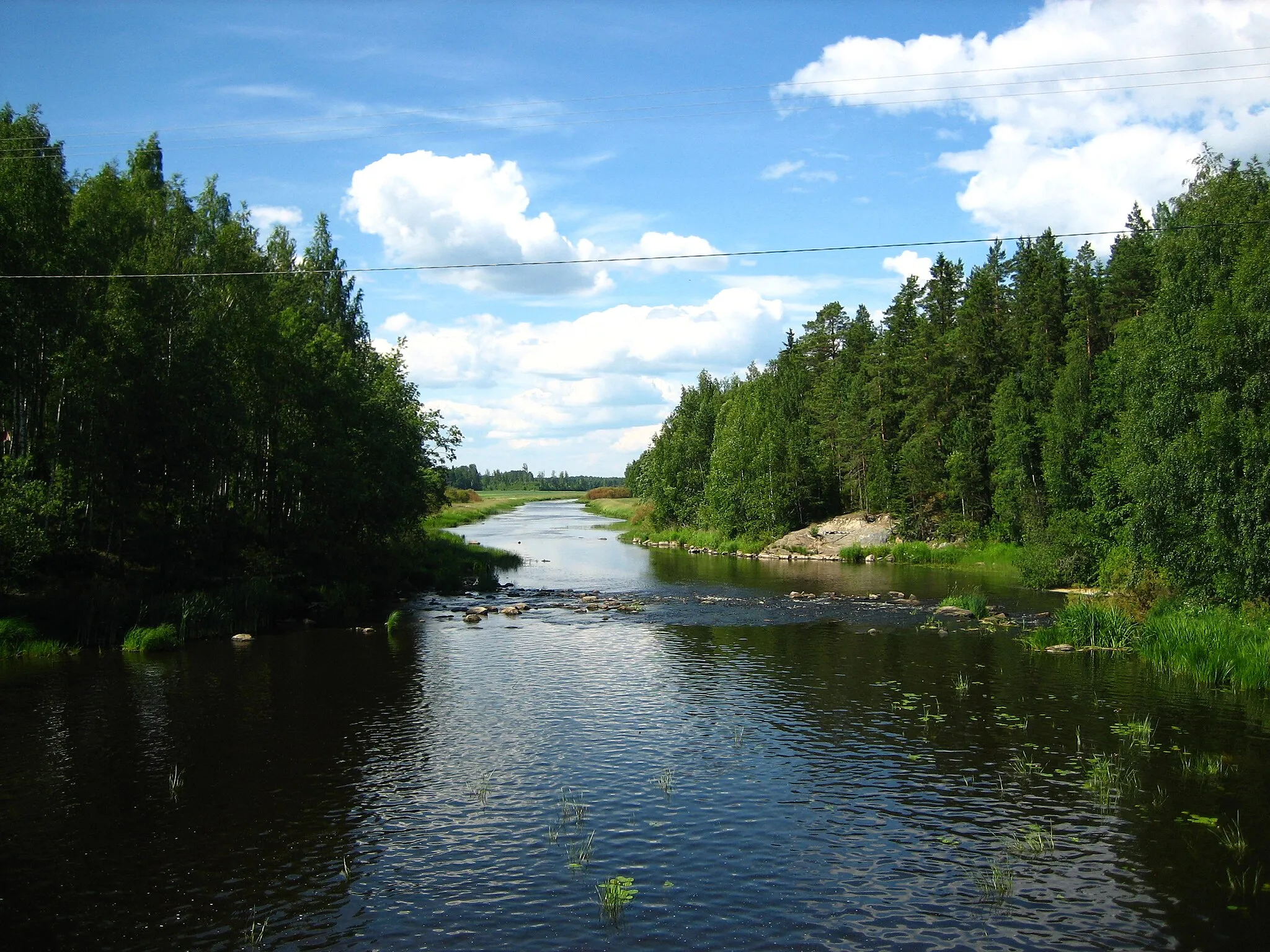 Photo showing: Pomarkku River, Finland, seen from the Riuttansalmi bridge towards northwest