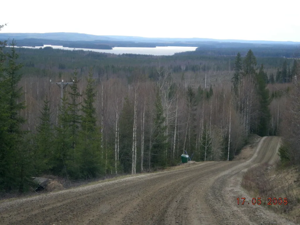 Photo showing: Amazing landscape in Kivikyläntie, Ristijärvi, Finland. Very high hills and beautiful landscapes along this road. Date in the photo.