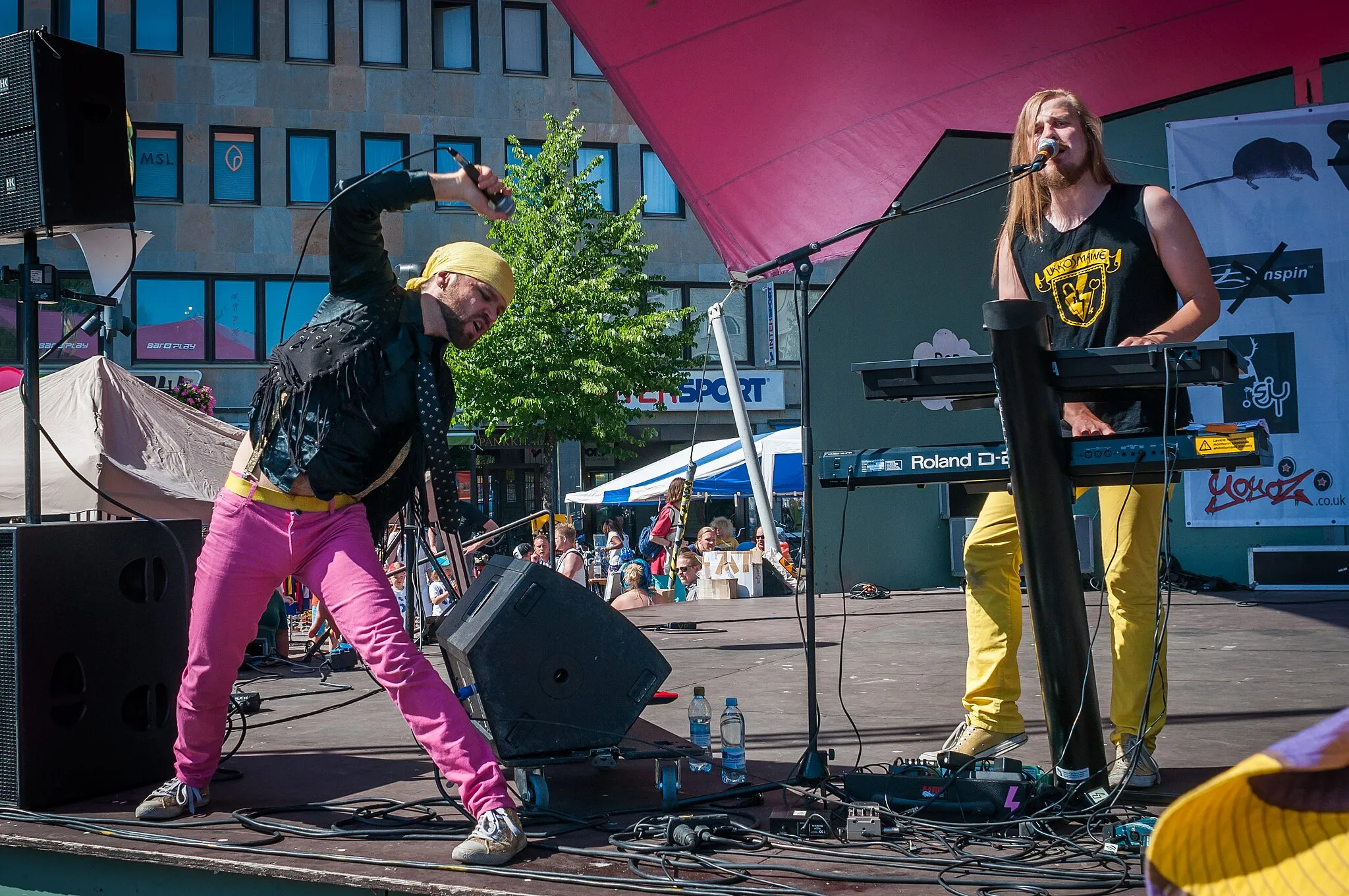 Photo showing: Finnish synth pop band Ukkosmaine performing at the Popkatu festival at the Joensuu market square in Finland.