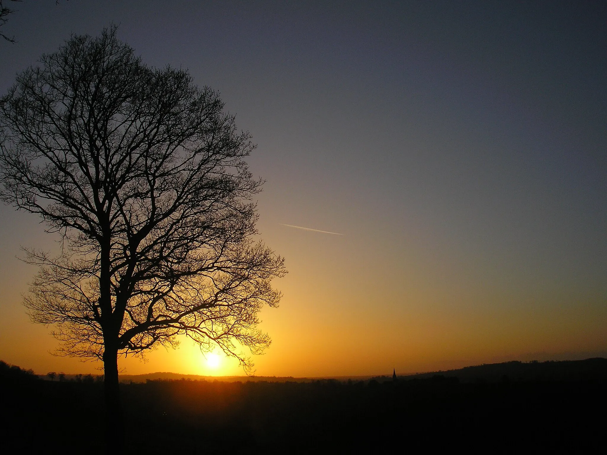 Photo showing: Saint-Martin-Don (Normandie, France). Coucher de soleil sur Pont-Bellanger et le Bocage virois.