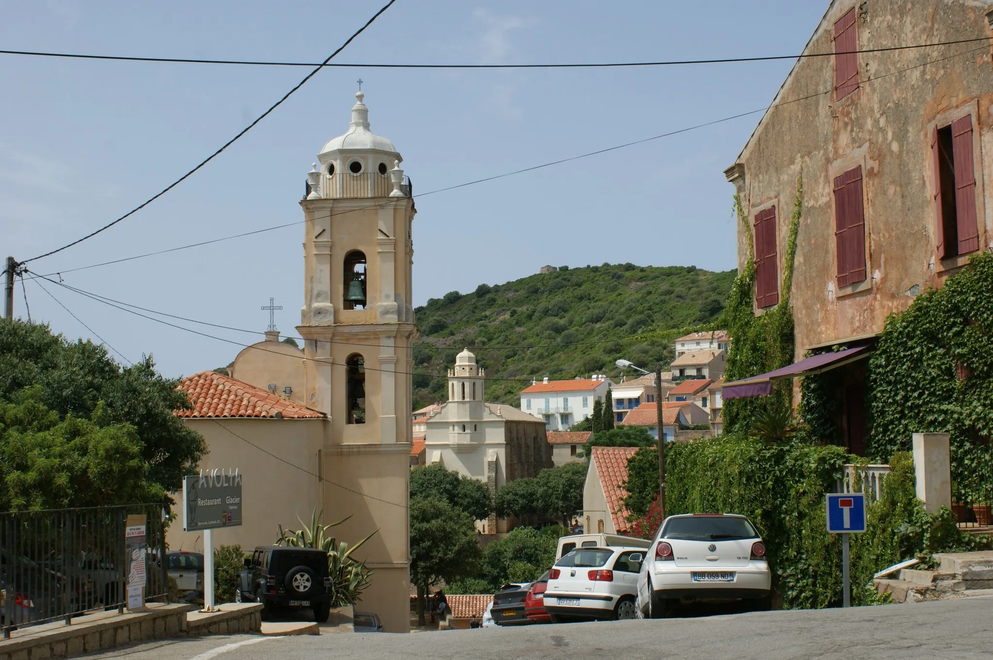 Photo showing: The Roman Catholic church (foreground) facing the Greek Orthodox church (background).