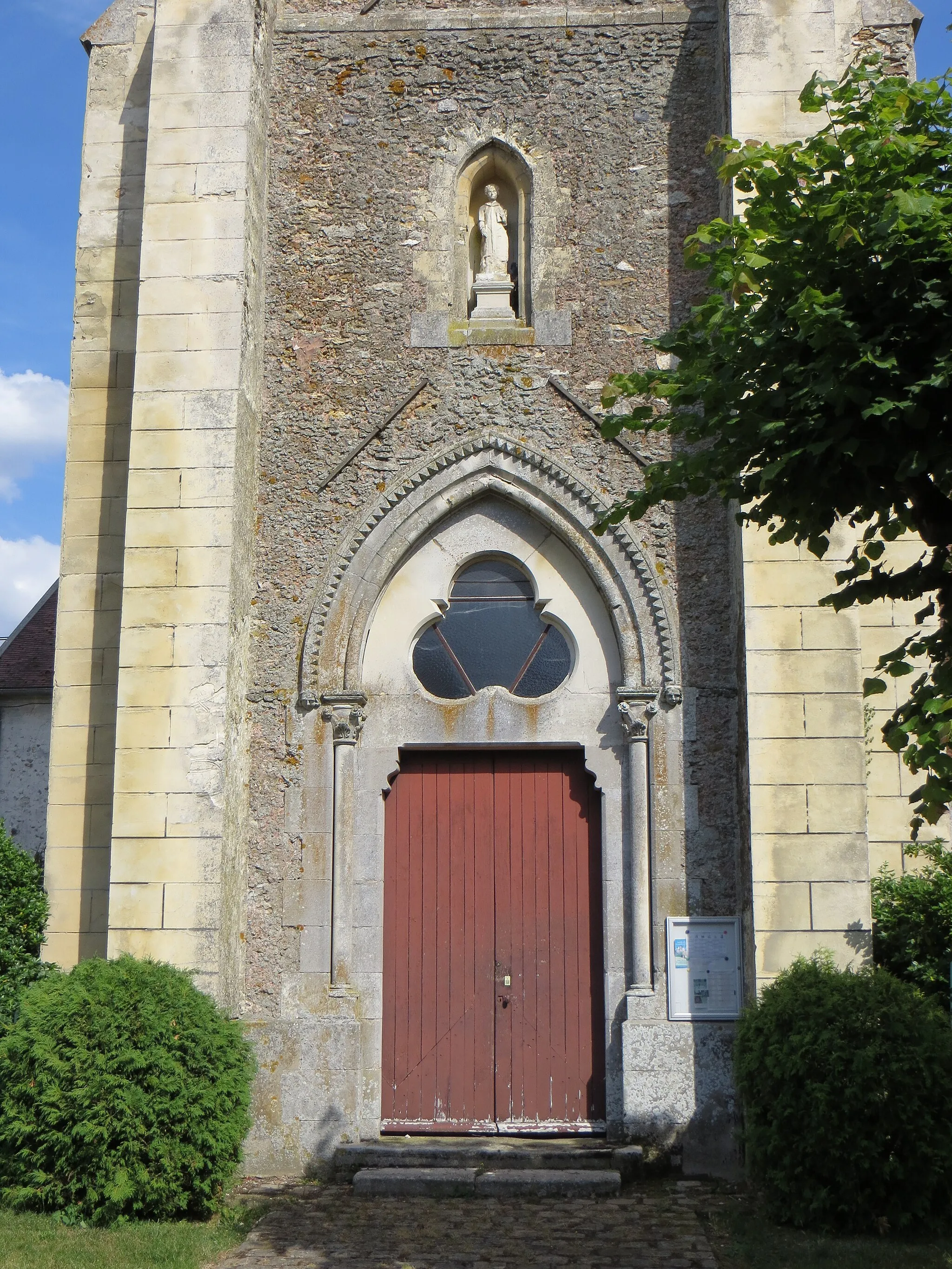 Photo showing: Porte de l'église