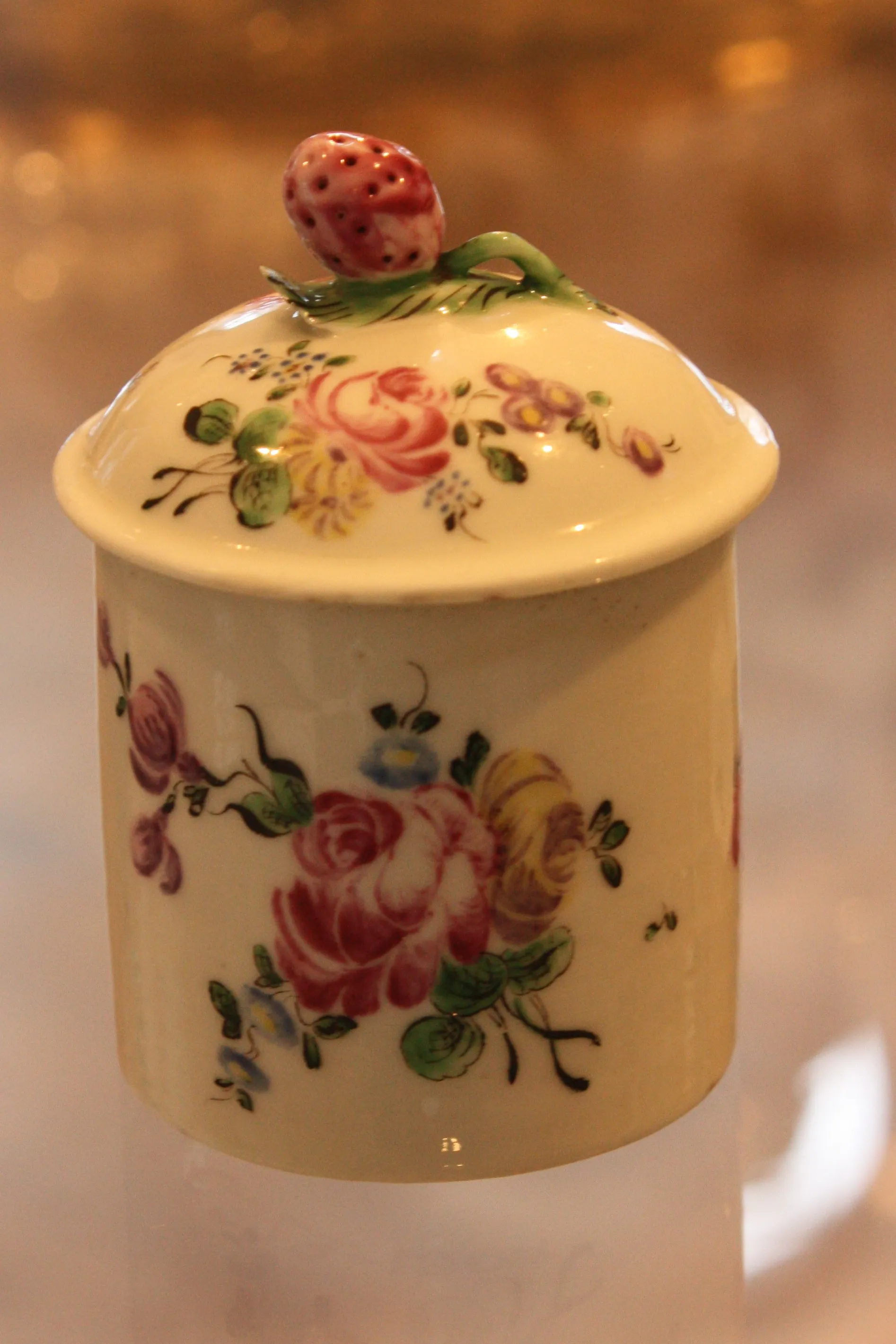 Photo showing: Lidded pot Mennecy, about 1760
Toilet pot and cover, porcelain, cylindrical, painted with flowers in polychrome enamels, Mennecy porcelain factory, France, about 1760
Lidded pots like these were used for makeup, pastes and powders
Given by J.H. Fitzhenry
