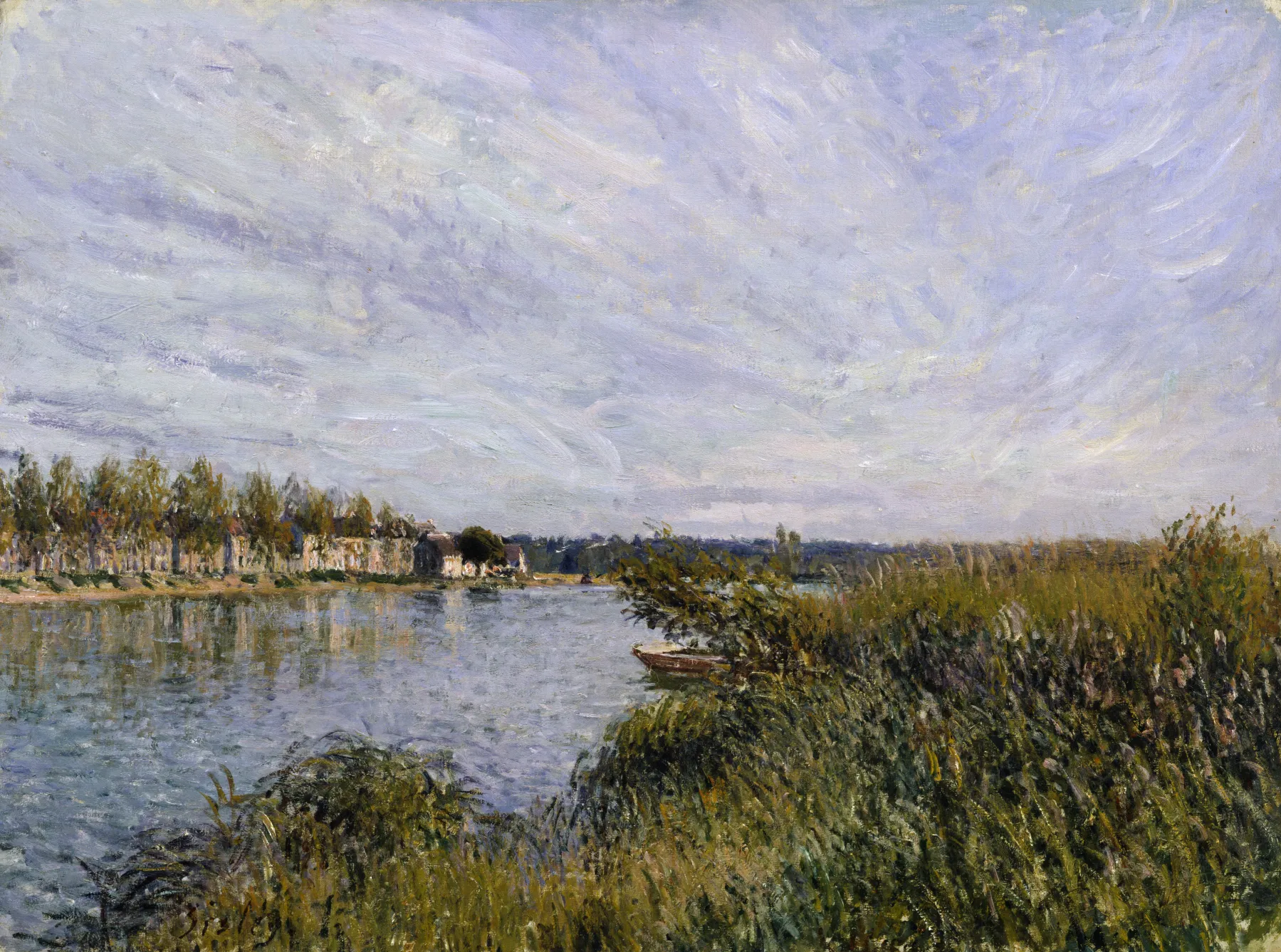 Photo showing: In 1880, Sisley moved from Paris to Veneux-Nadon, a few miles southeast of Fontainebleau, and remained in the region for the rest of his life. This view is one of several showing Saint-Mammès, a port town for barge traffic where the Seine and Loing Rivers meet, that Sisley painted at different times of the day from approximately the same location. By the 1880s, the artist had adopted a vigorous style, applying the pigments in rich, dense strokes.
