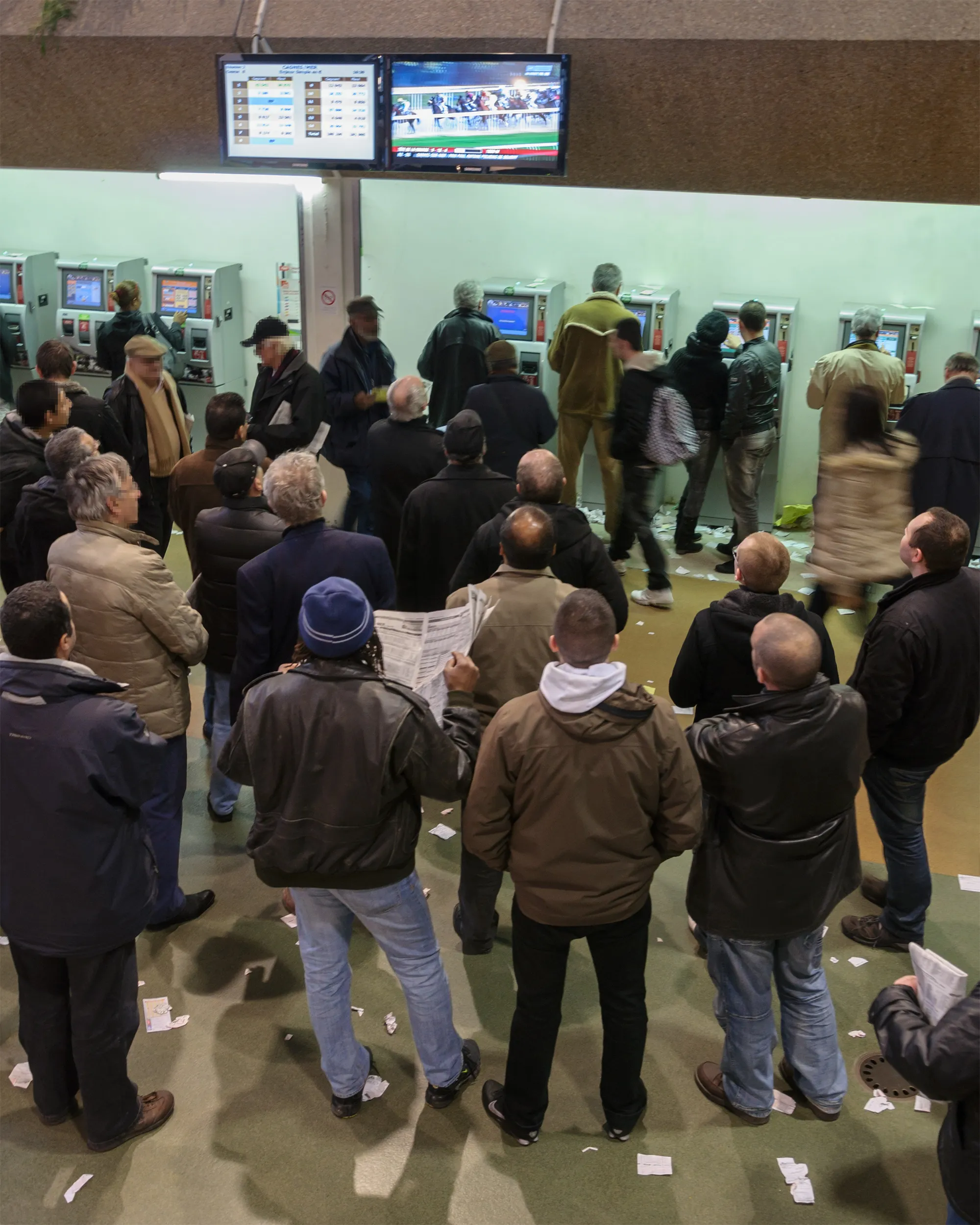 Photo showing: Horse race betting at Hippodrome Paris-Vincennes: waiting the results of a horse race.