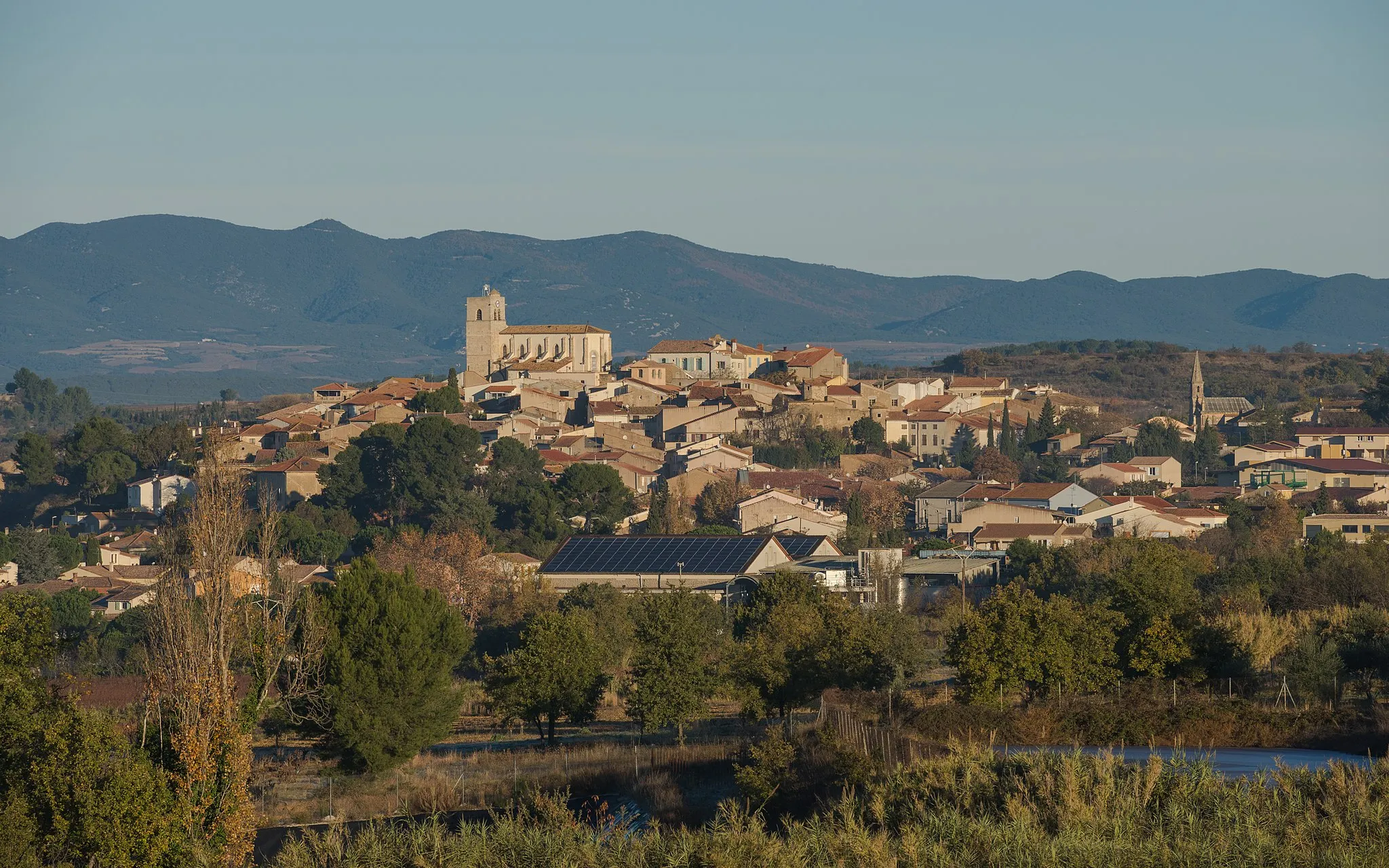 Photo showing: The historic part of the village built on a hill. Corneilhan, Hérault, France.