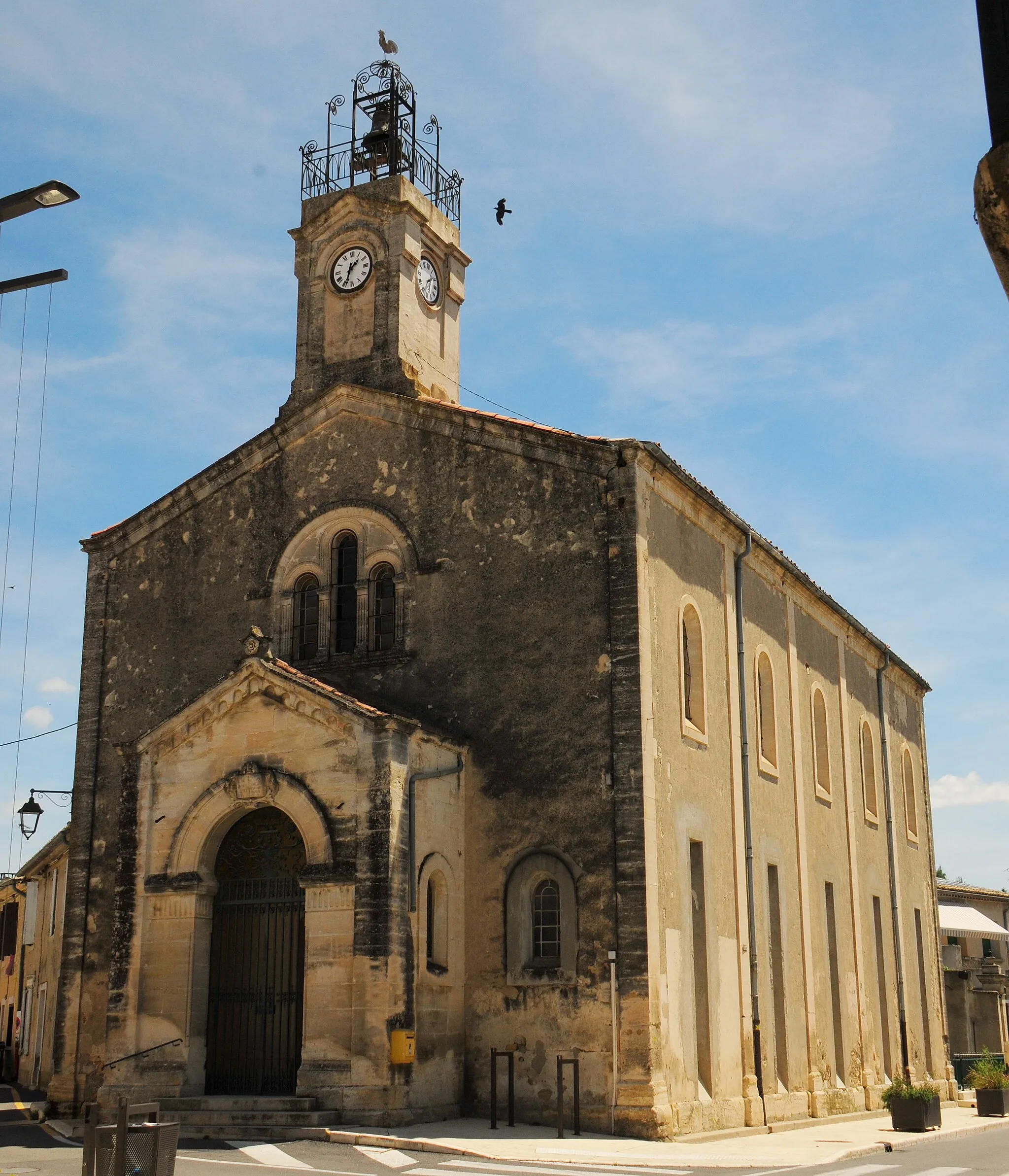 Photo showing: Church of Caveirac at 19 June 2015, with nice clocktower of iron
