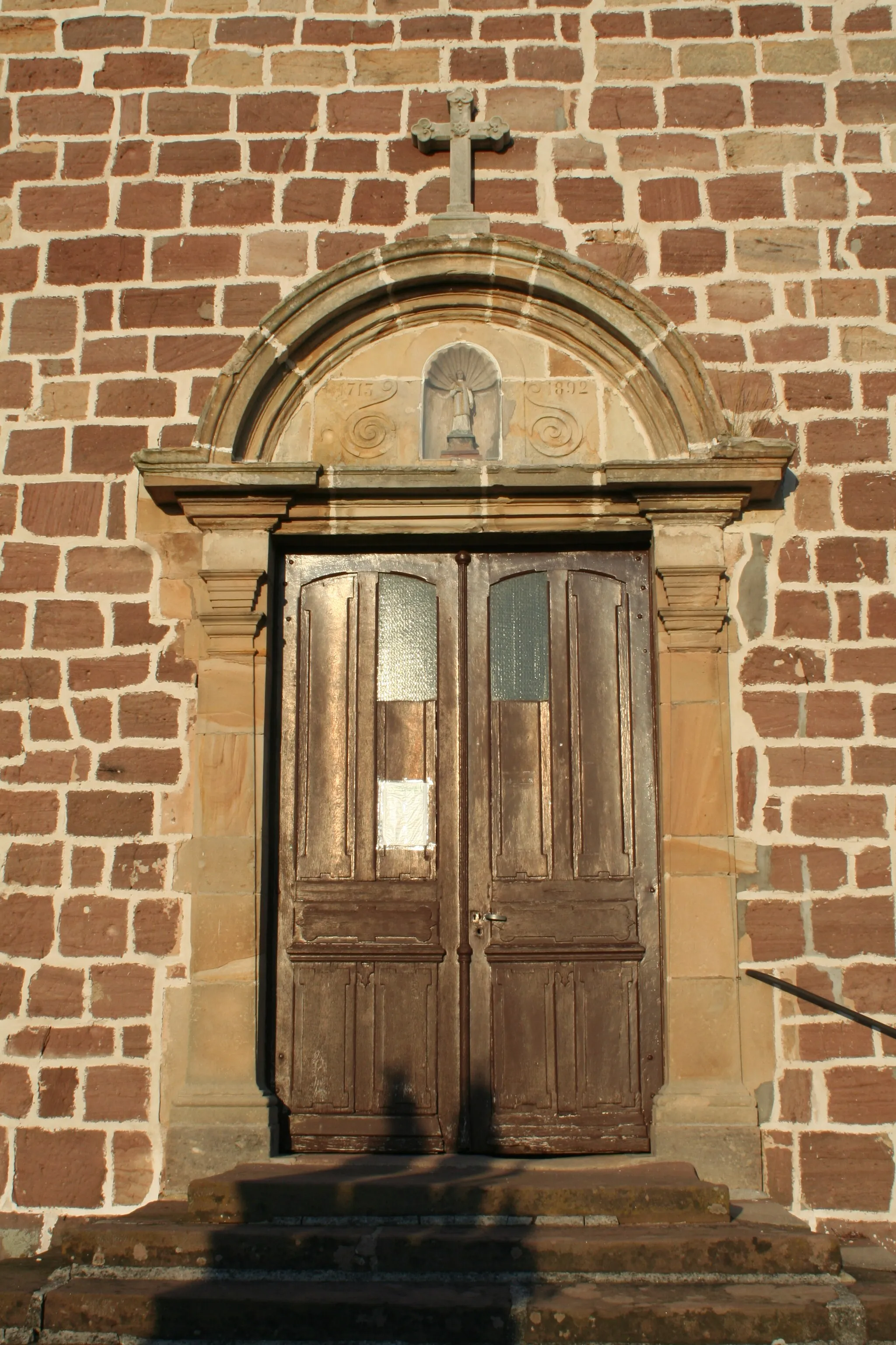 Photo showing: Portail de l'église d'Housseras (Vosges)