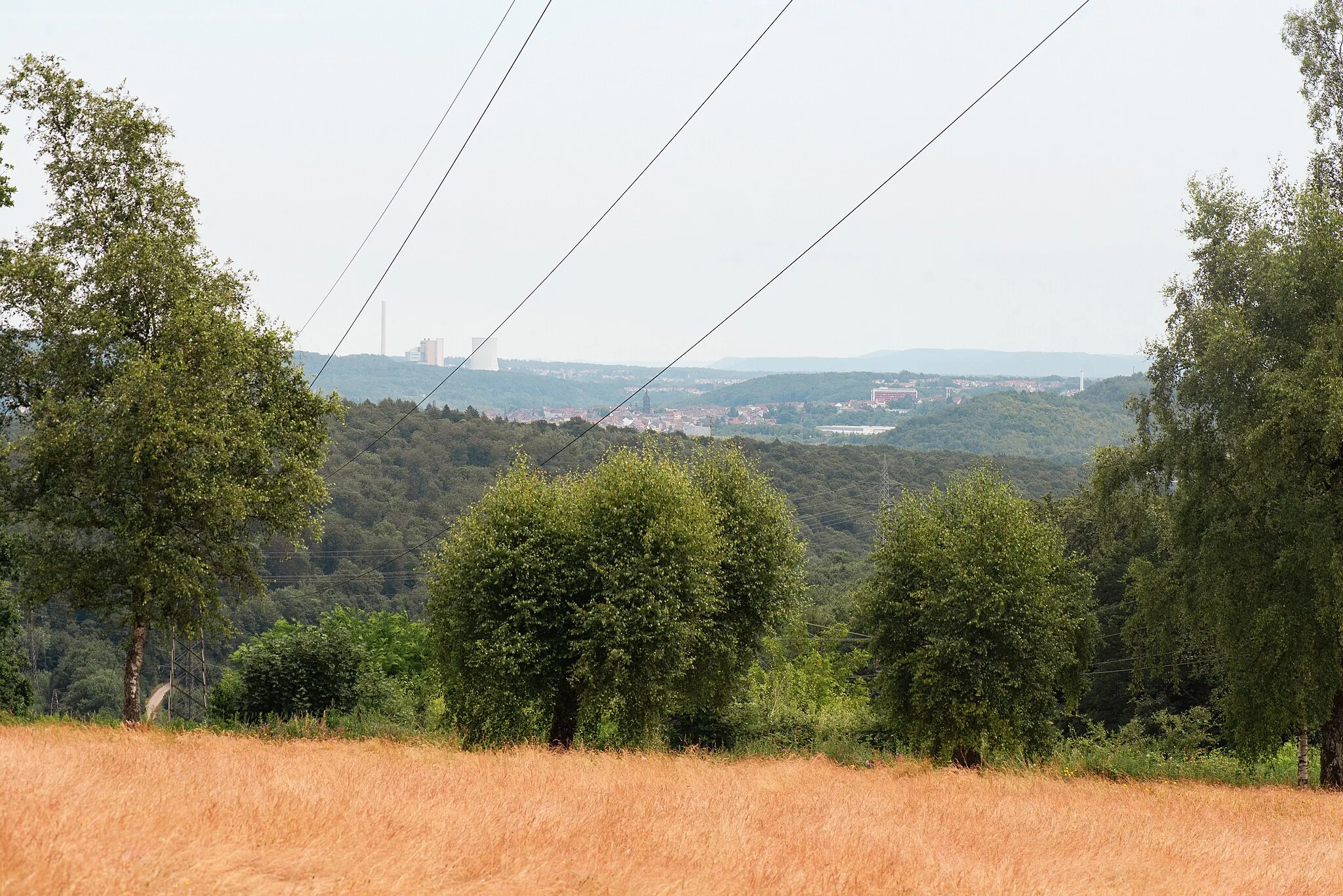 Photo showing: View from the Hoferkopf. Among other things one can see a church and a power station.