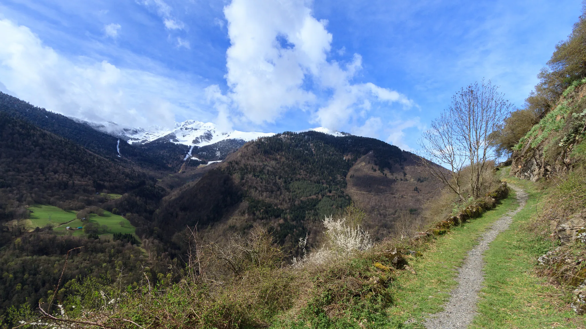 Photo showing: 500px provided description: After a nice little hike from Bagn?re de Luchon Luchon, we arrive to Cazaril with this little path on the right and the valley on our left. [#Snow ,#France ,#Blue ,#Sky ,#Mountain ,#Clouds ,#Grass ,#Scenery ,#Path]
