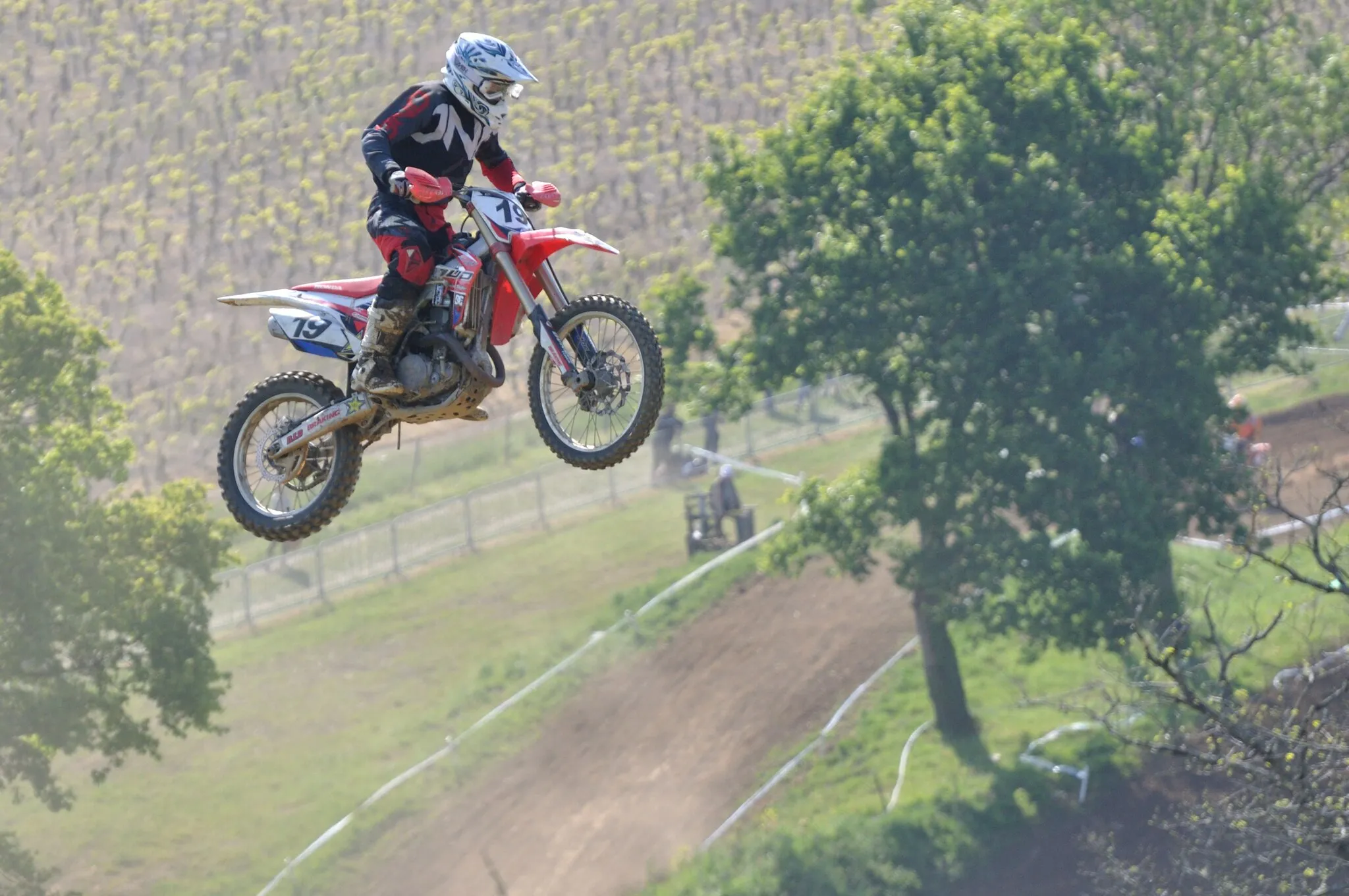 Photo showing: Motorcycle jump during a motocross race in Barbechat, France