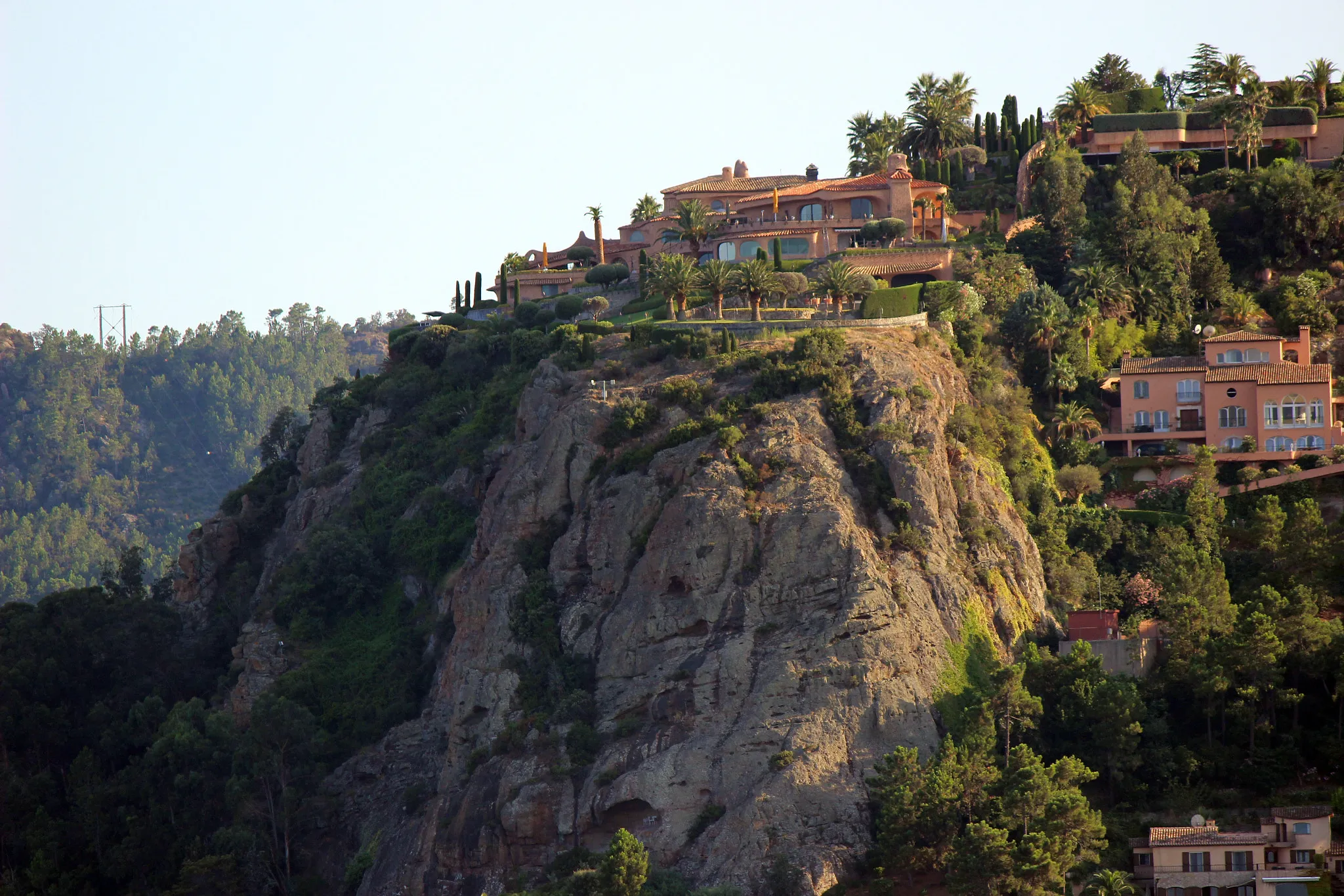 Photo showing: 500px provided description: San Peyre 3 [#trees ,#sky ,#forest ,#sun ,#light ,#house ,#rock ,#architecture ,#tree ,#summer ,#beautiful ,#green ,#france ,#top ,#mountain ,#maison]