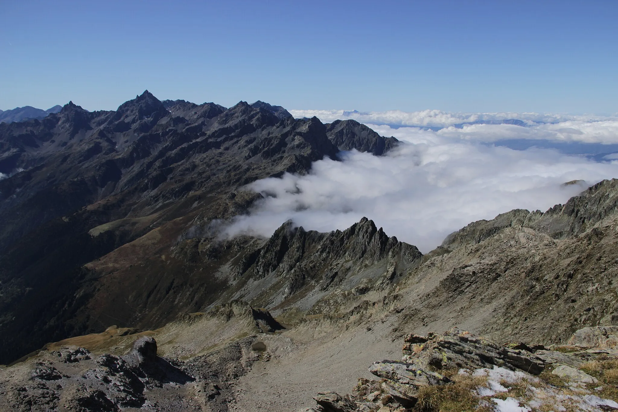 Photo showing: Clouds coming over the ridge