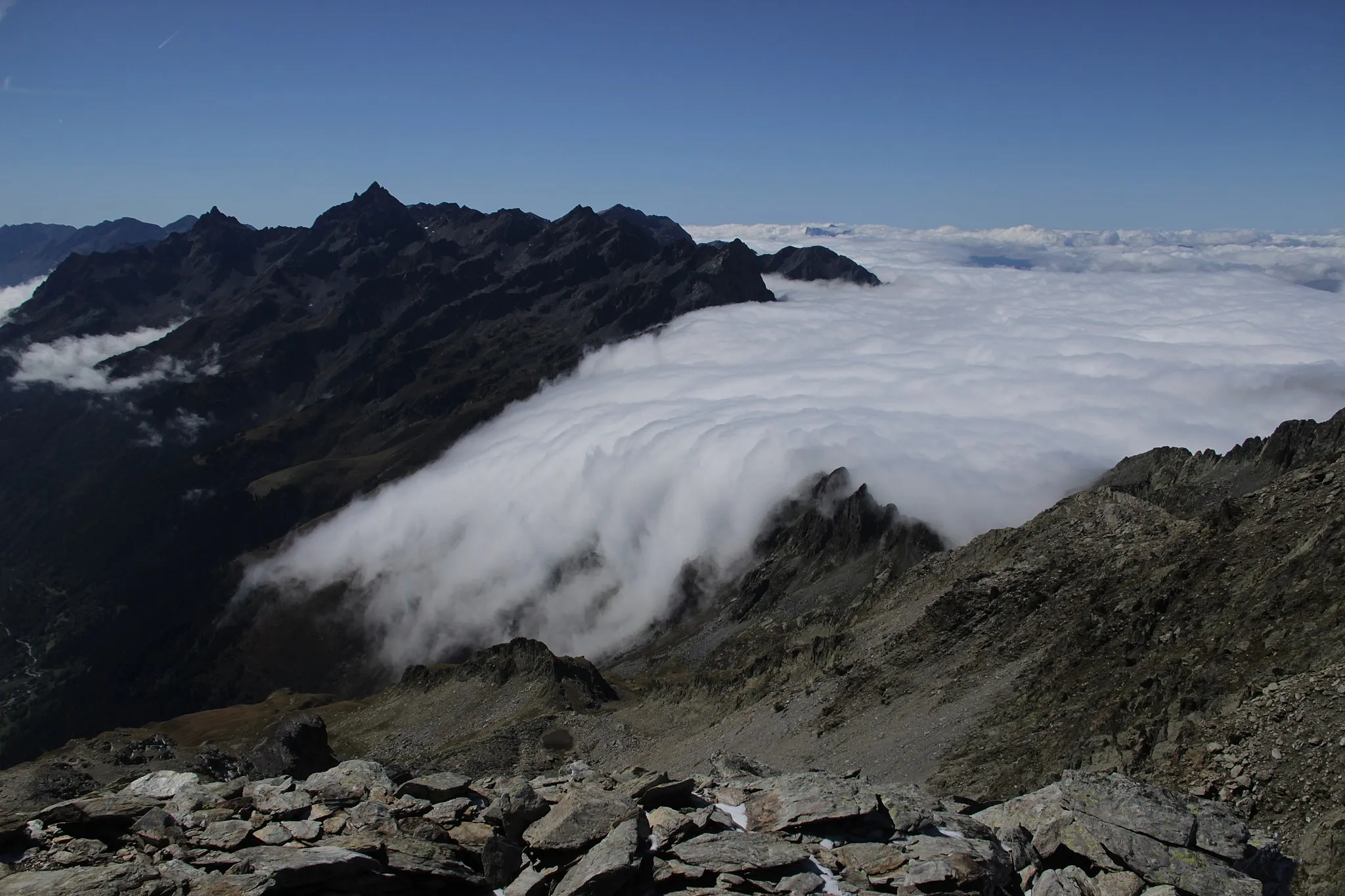 Photo showing: Clouds coming over the ridge