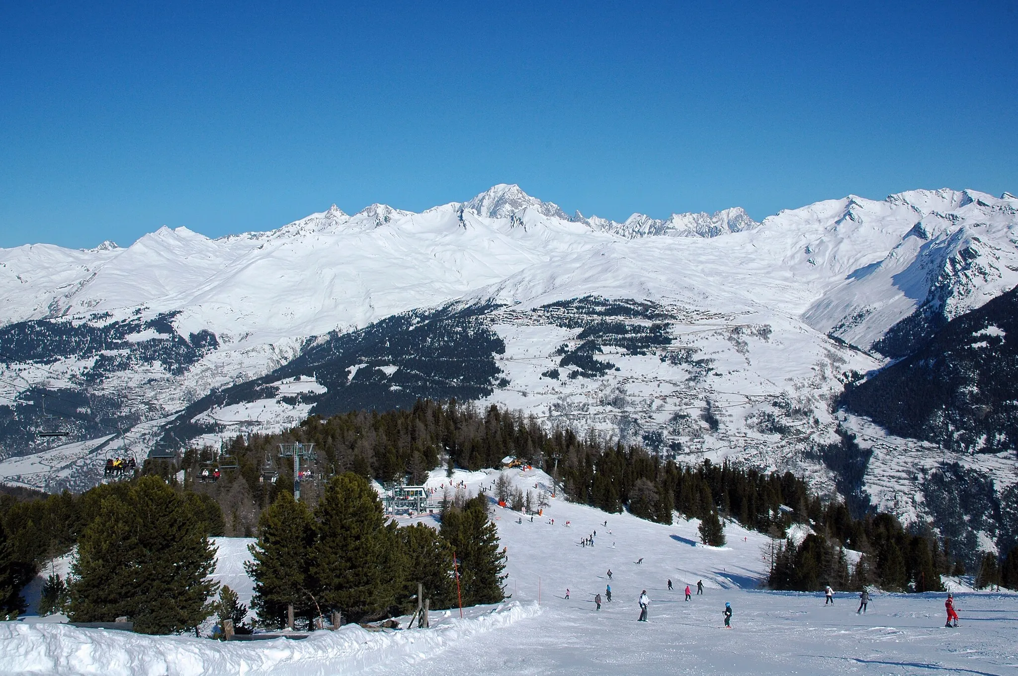 Photo showing: Looking down the slopes towards Plan des Violettes and Droset ski lifts, Villaroger, 2012