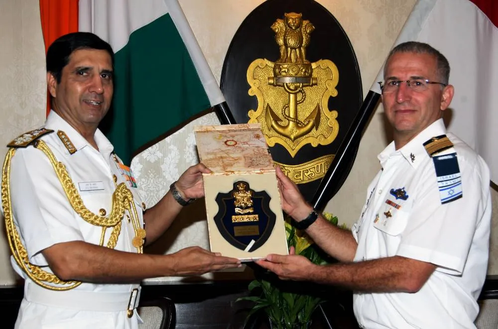 Photo showing: Adm RK Dhowan CNS exchanging the memento with VAdm Ram Rutberg Commander-in-Chief, Israeli Navy at IHQ MoD, New Delhi