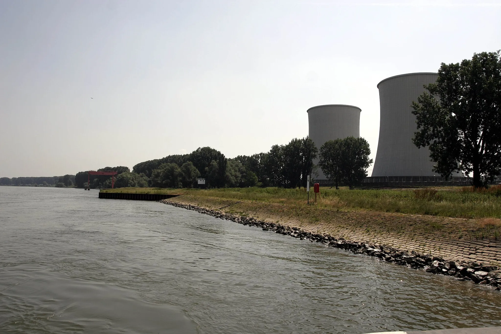 Photo showing: Biblis Nuclear Power Plant (Germany), cooling towers from block B seen from South-West and the Rhine river.