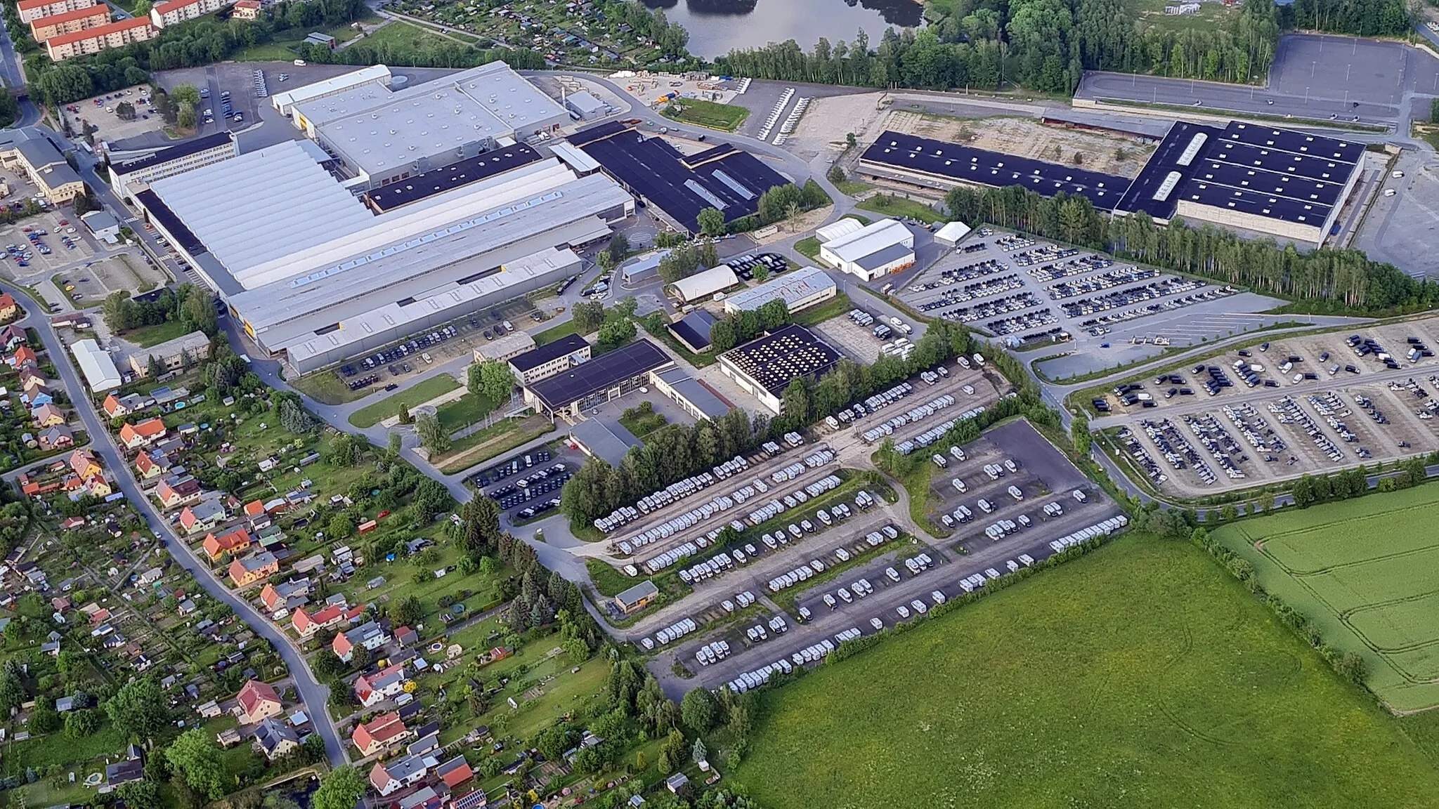 Photo showing: Industriegebiet in Neustadt (Sachsen): ehemaliges Fortschritt Landmaschinenbaugelände; durchläuft durch die Ansiedlung des Wohnmobilherstellers CAPRON eine Revitalisierung von 14 ha Industriebrache zu einem Industriepark