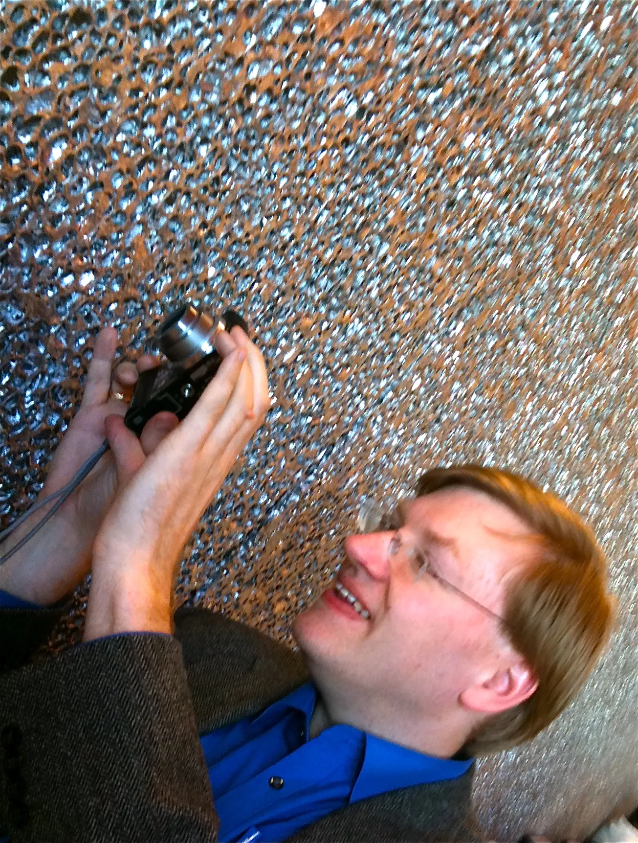 Photo showing: Anders shooting the metallic wall with meteor craters