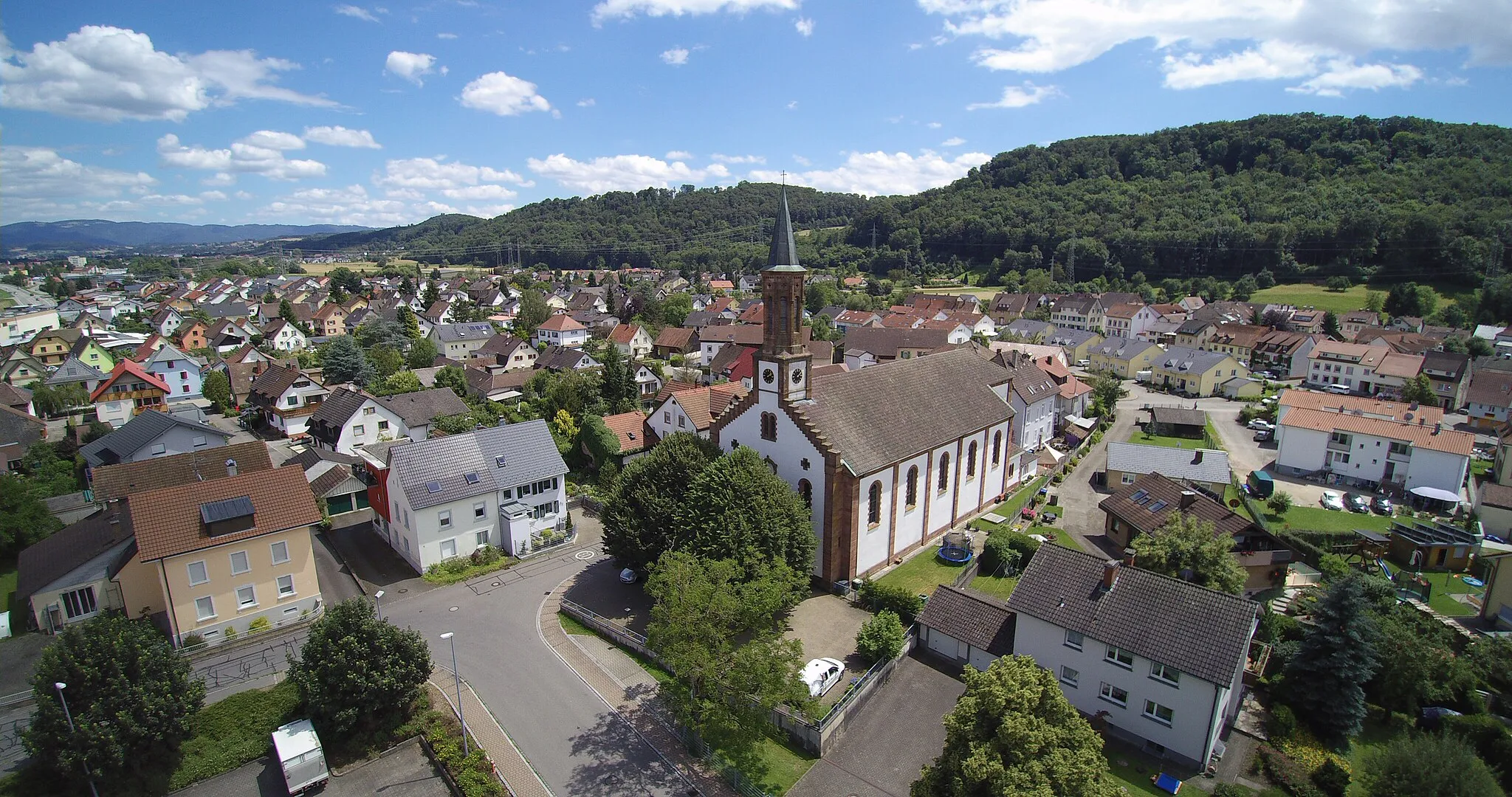 Photo showing: Aerial Viea of the church Immaculate Conception in Höllstein in southern Baden-Württemberg, Germany.