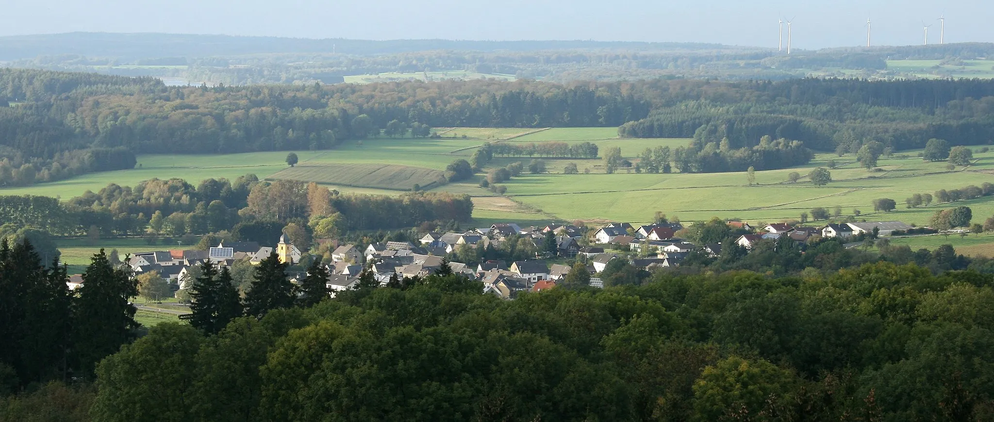 Photo showing: View over Wölferlingen village in Westerwald, Rhineland-Palatinate, Germany. Seen from the Helleberg mountain