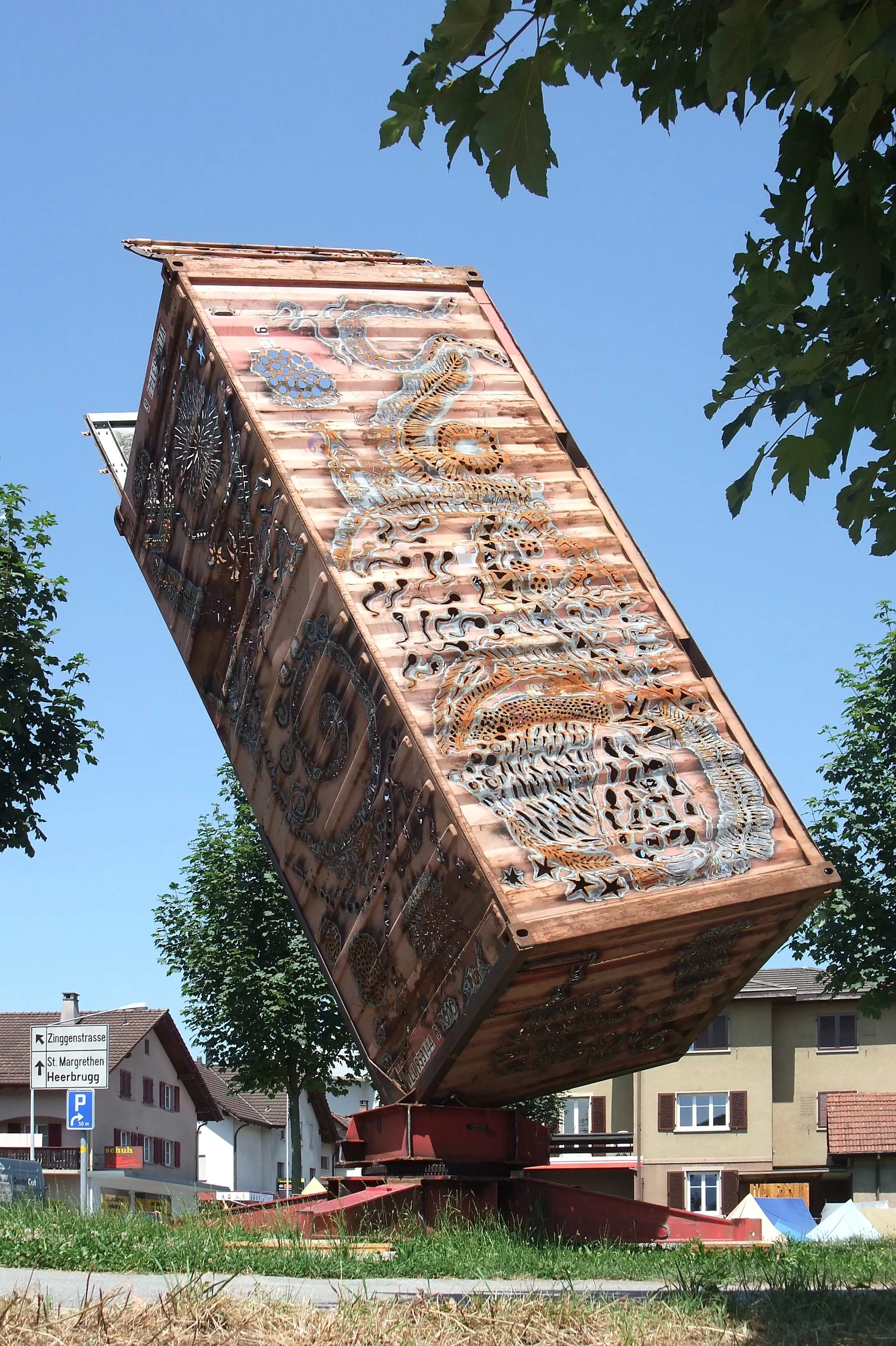 Photo showing: Sylvain Köppel: Container Lantern. He has actually done it and accomplished his gigantic lantern. It was an old transport container which he has wrought with the welding torch on the 3rd Symposium of Artists in Widnau. Unfortunately I had no opportunity yet to see how it looks in the dark.