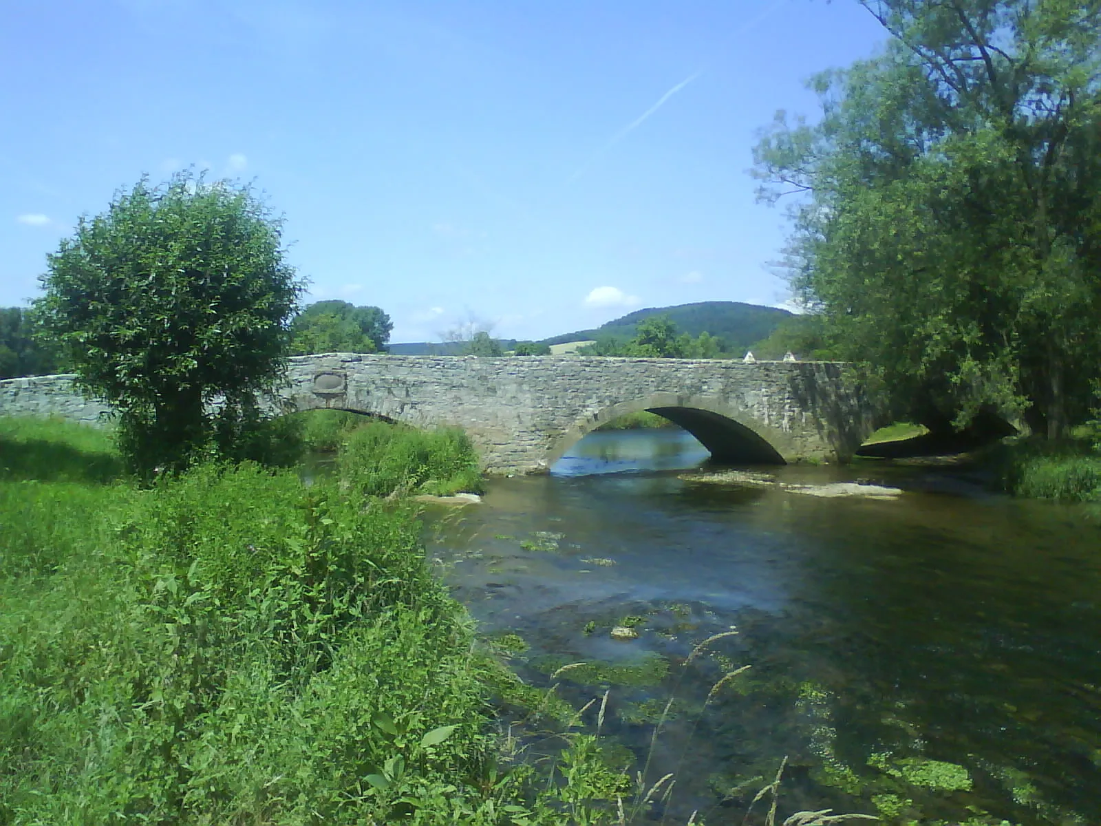 Photo showing: 1710 stone bridge crossing the Nethe River in town of Höxter, District of Höxter, North Rhine-Westphalia, Germany.