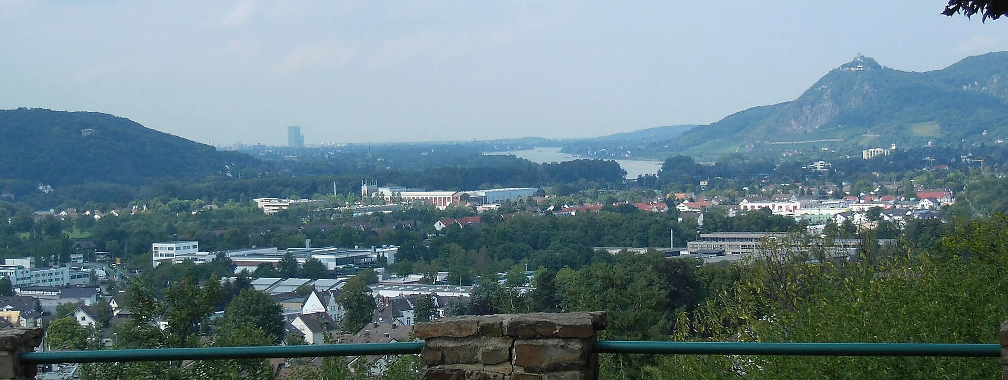 Photo showing: View of Bad Honnef and Bonn from the elevation Koppel in de:Rheinbreitbach. In the background the highrises Post Tower and Langer Eugen can be seen.